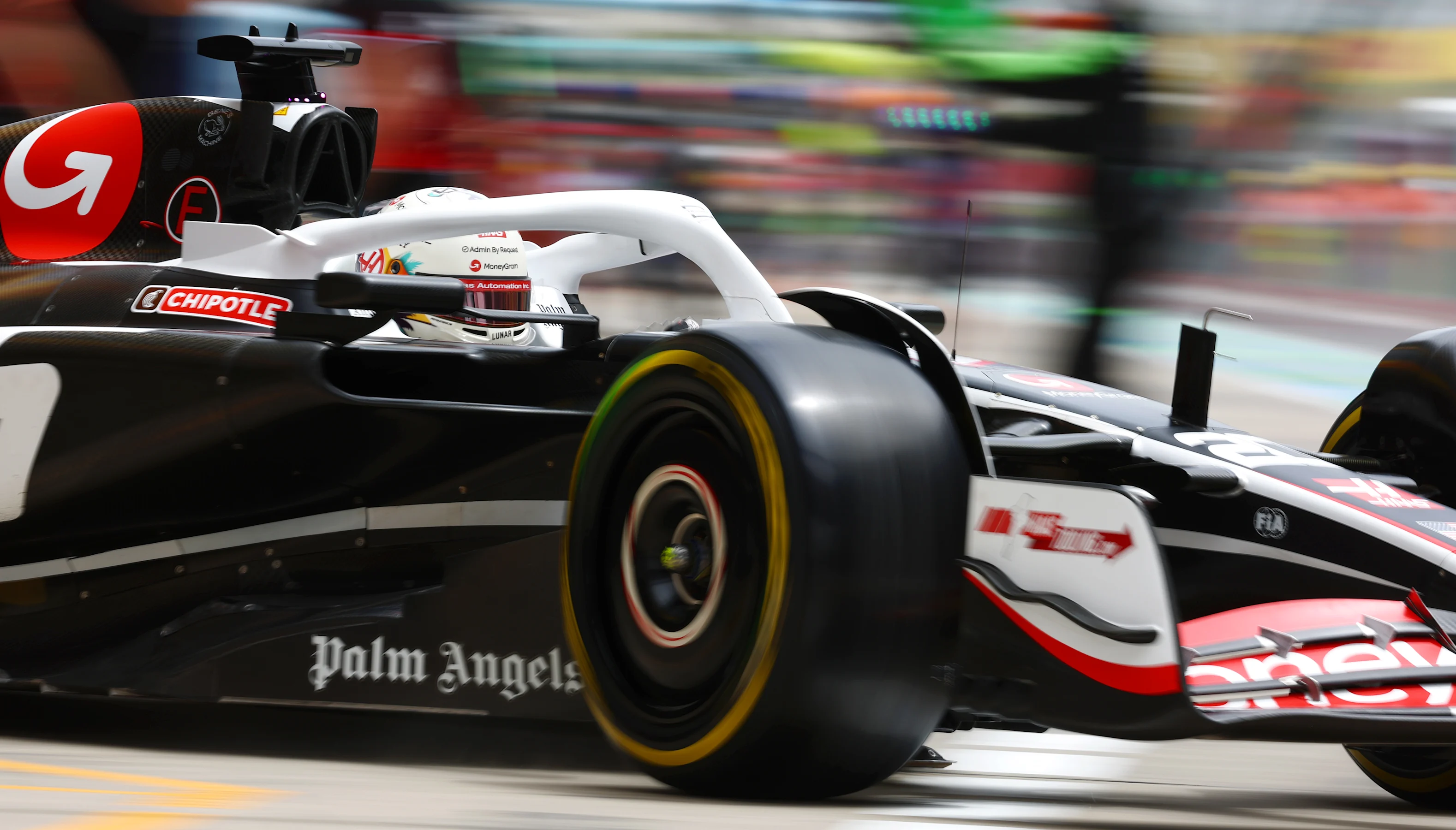 SHANGHAI, CHINA - APRIL 19: Kevin Magnussen of Denmark and Haas F1 leaves the garage during