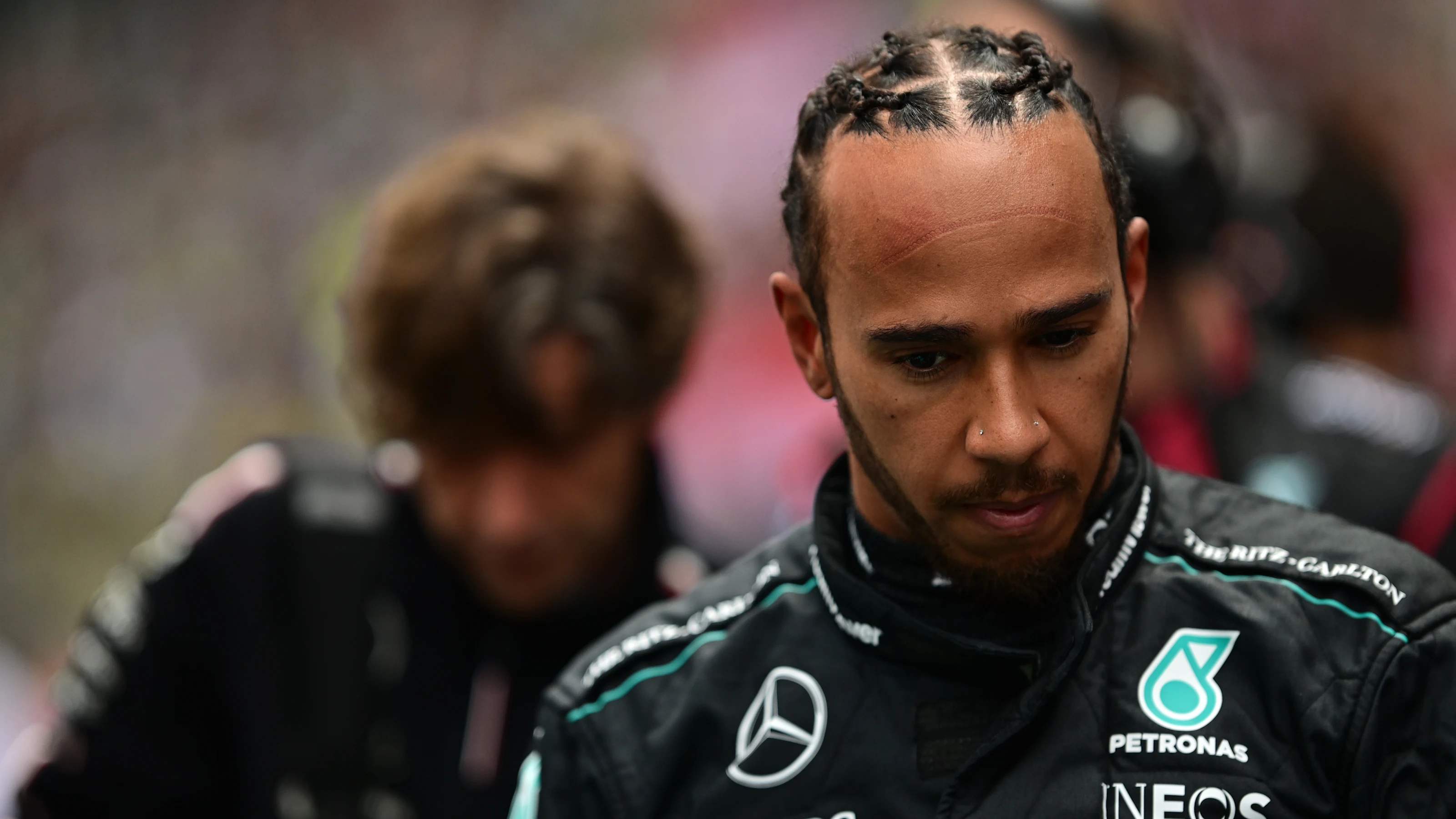 SHANGHAI, CHINA - APRIL 20: Lewis Hamilton of Great Britain and Mercedes looks on, on the grid