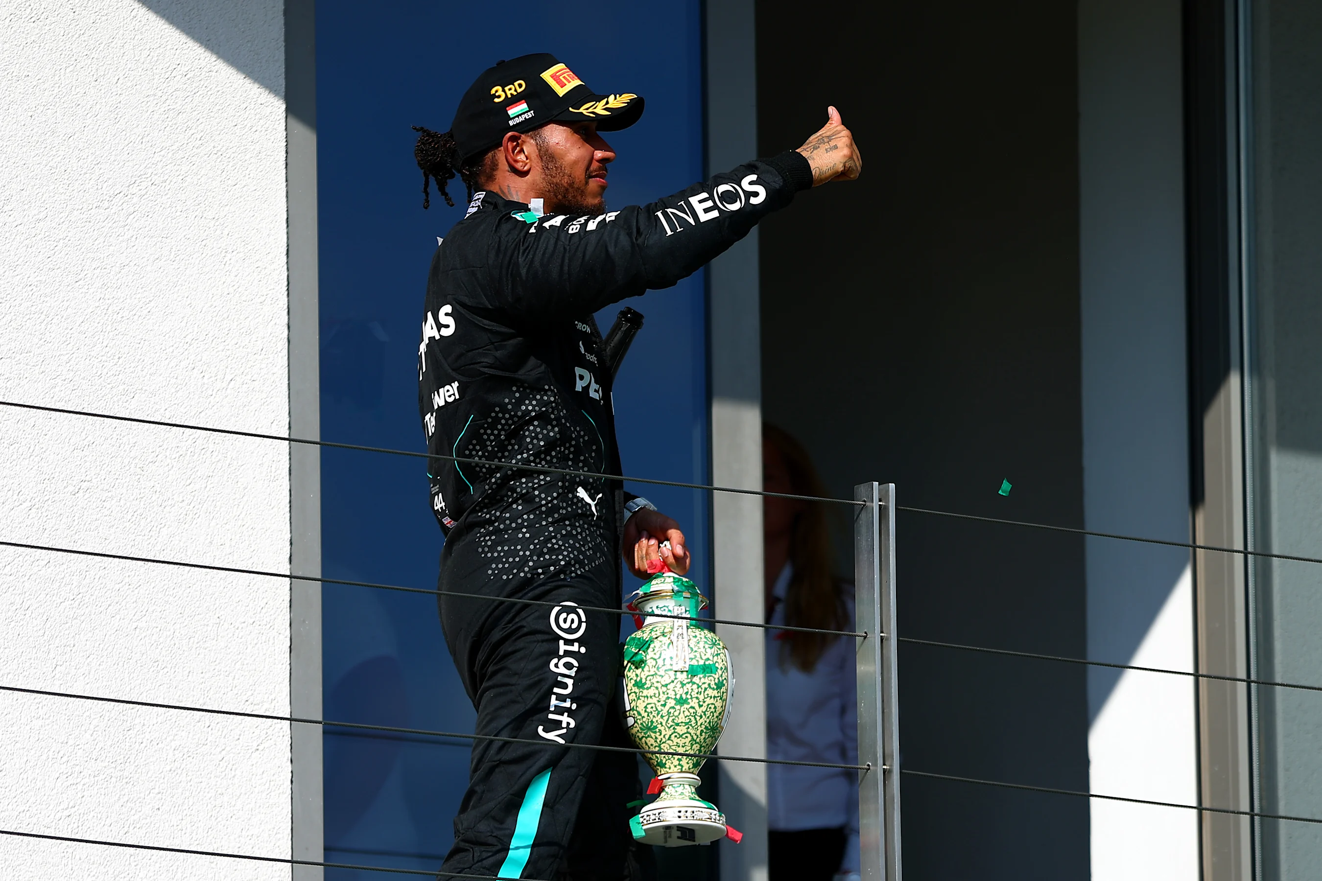 BUDAPEST, HUNGARY - JULY 21: Third placed Lewis Hamilton of Great Britain and Mercedes celebrates