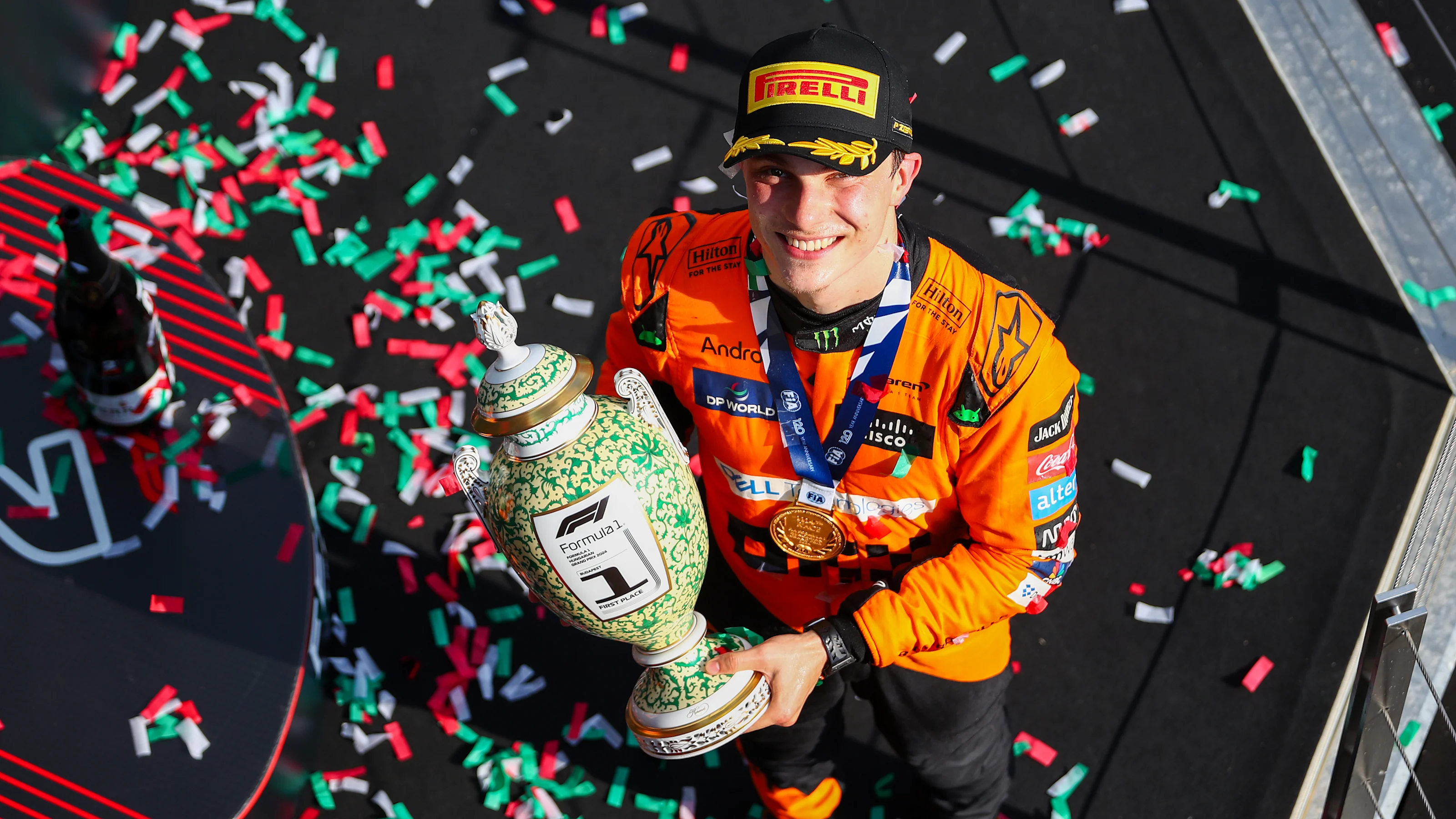 BUDAPEST, HUNGARY - JULY 21: Oscar Piastri of McLaren and Australia with the winners trophy after