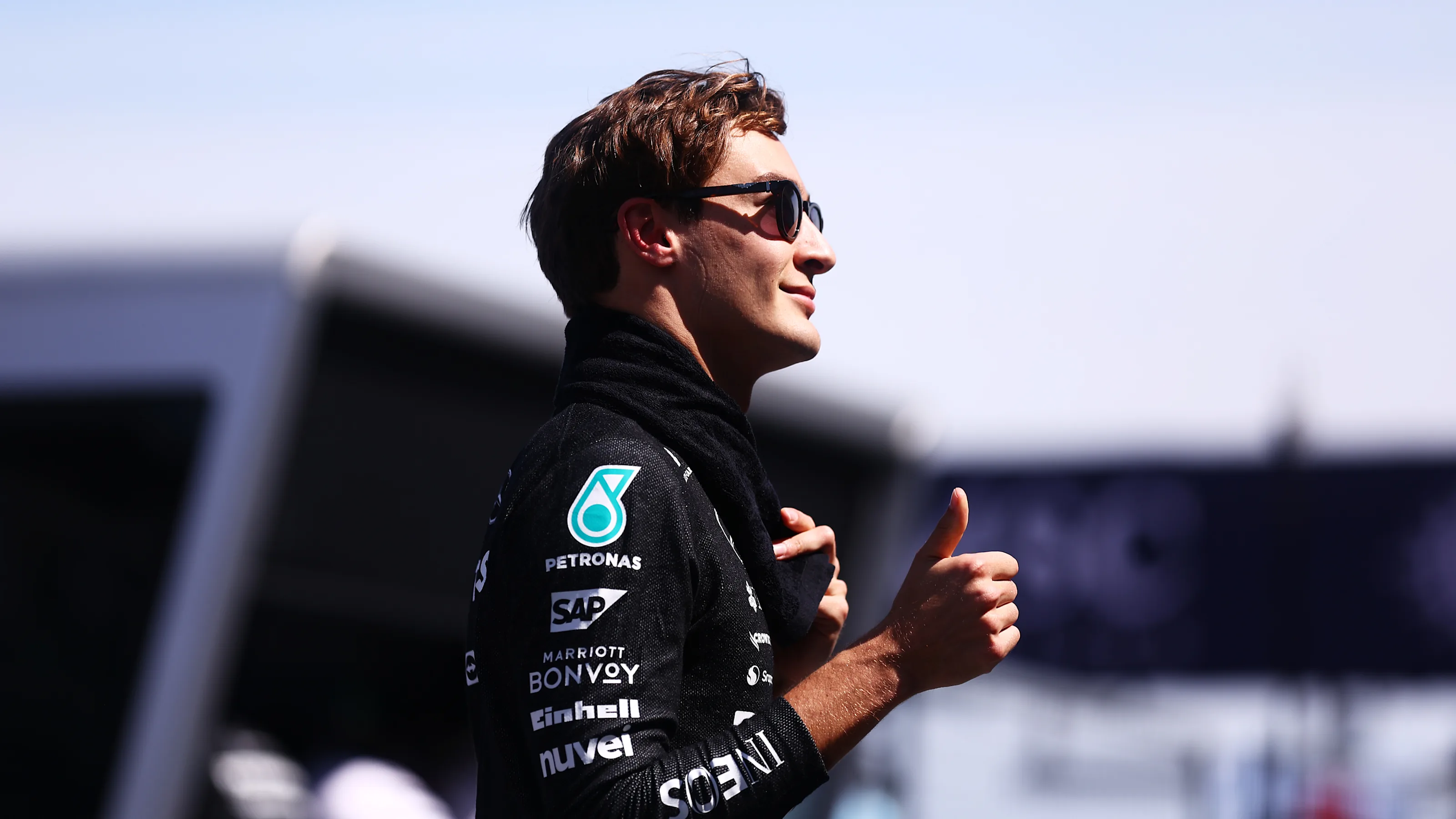 SUZUKA, JAPAN - APRIL 07: George Russell of Great Britain and Mercedes reacts on the grid prior to