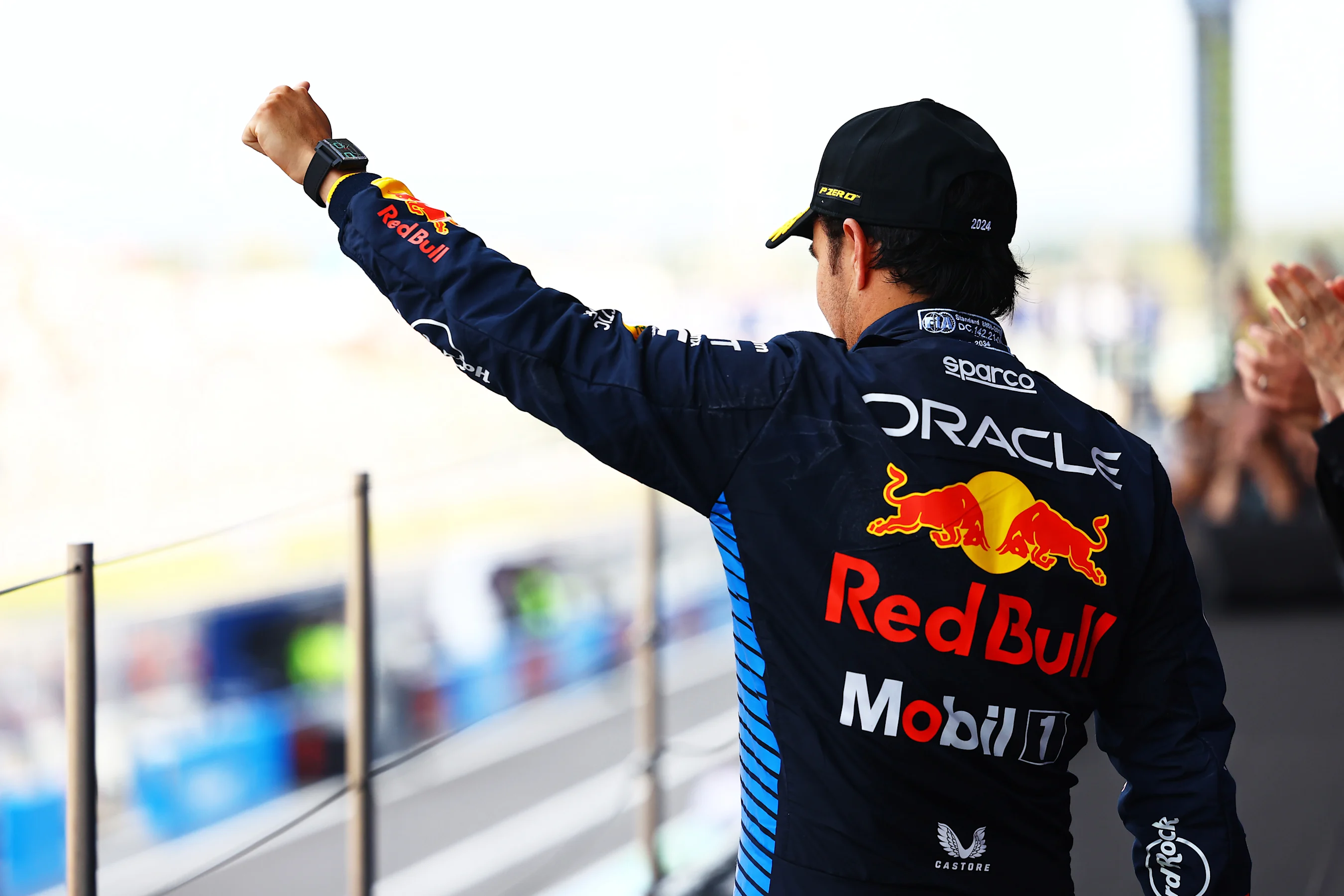 SUZUKA, JAPAN - APRIL 07: Second placed Sergio Perez of Mexico and Oracle Red Bull Racing