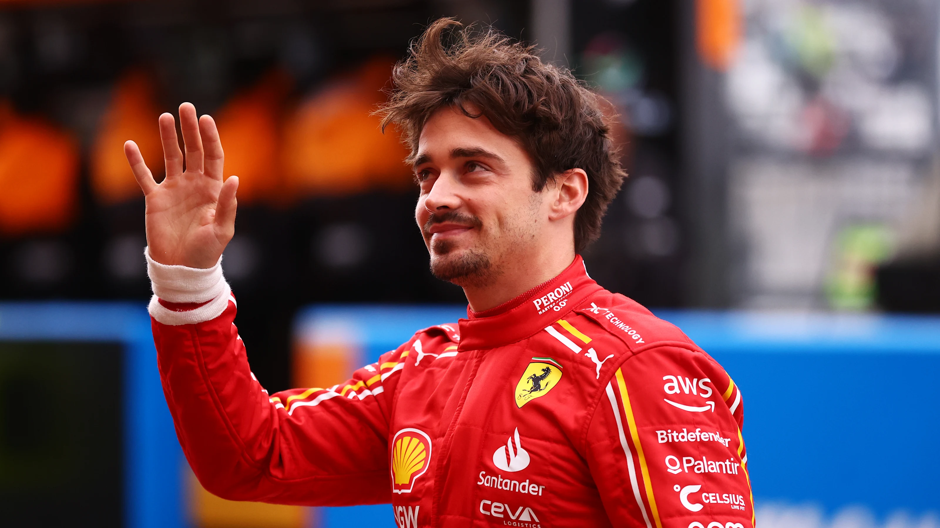 SUZUKA, JAPAN - APRIL 05: Charles Leclerc of Monaco and Ferrari waves from the pitlane during