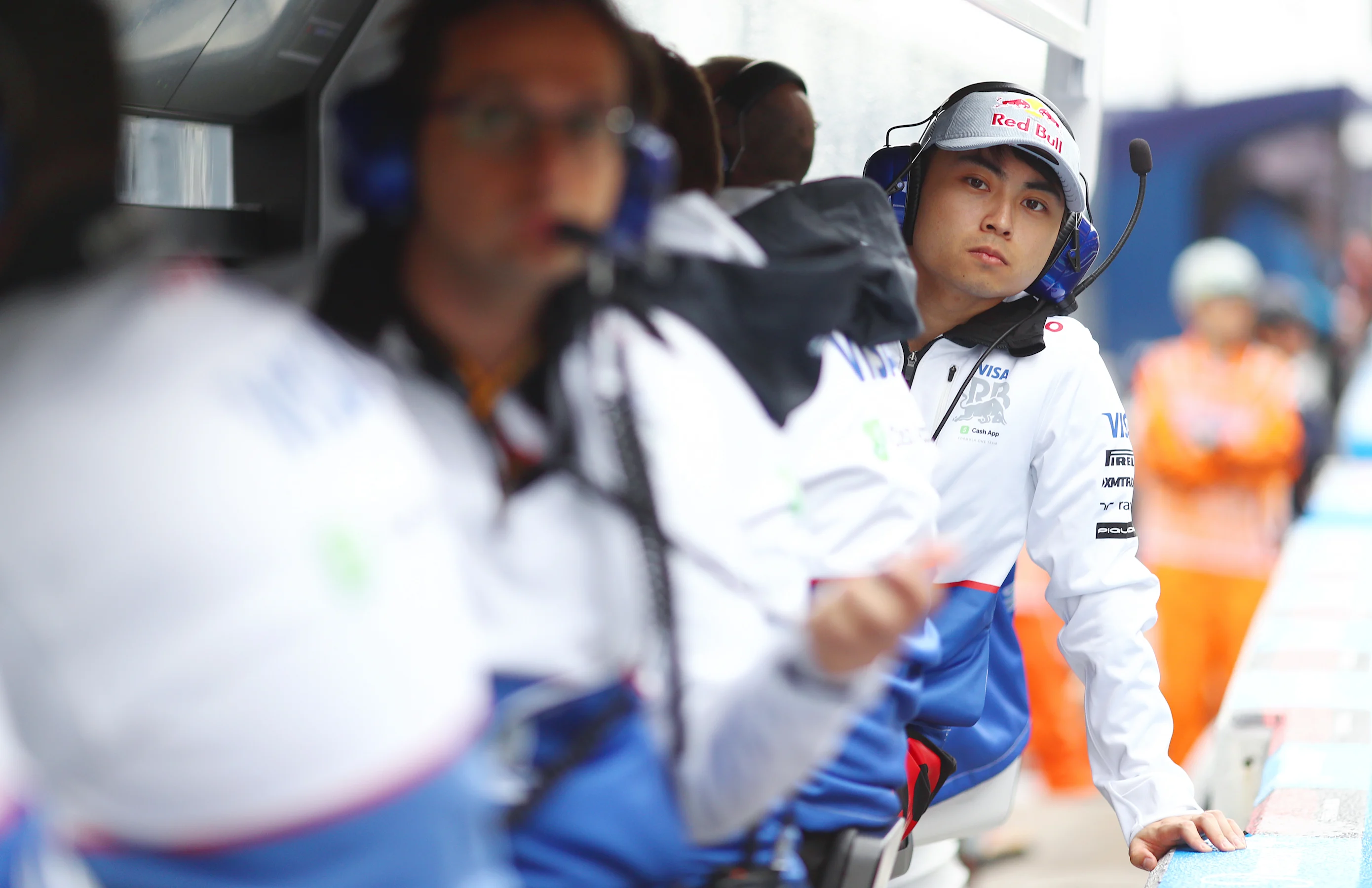 SUZUKA, JAPAN - APRIL 05: Ayumu Iwasa of Japan and Visa Cash App RB looks on from the pitwall