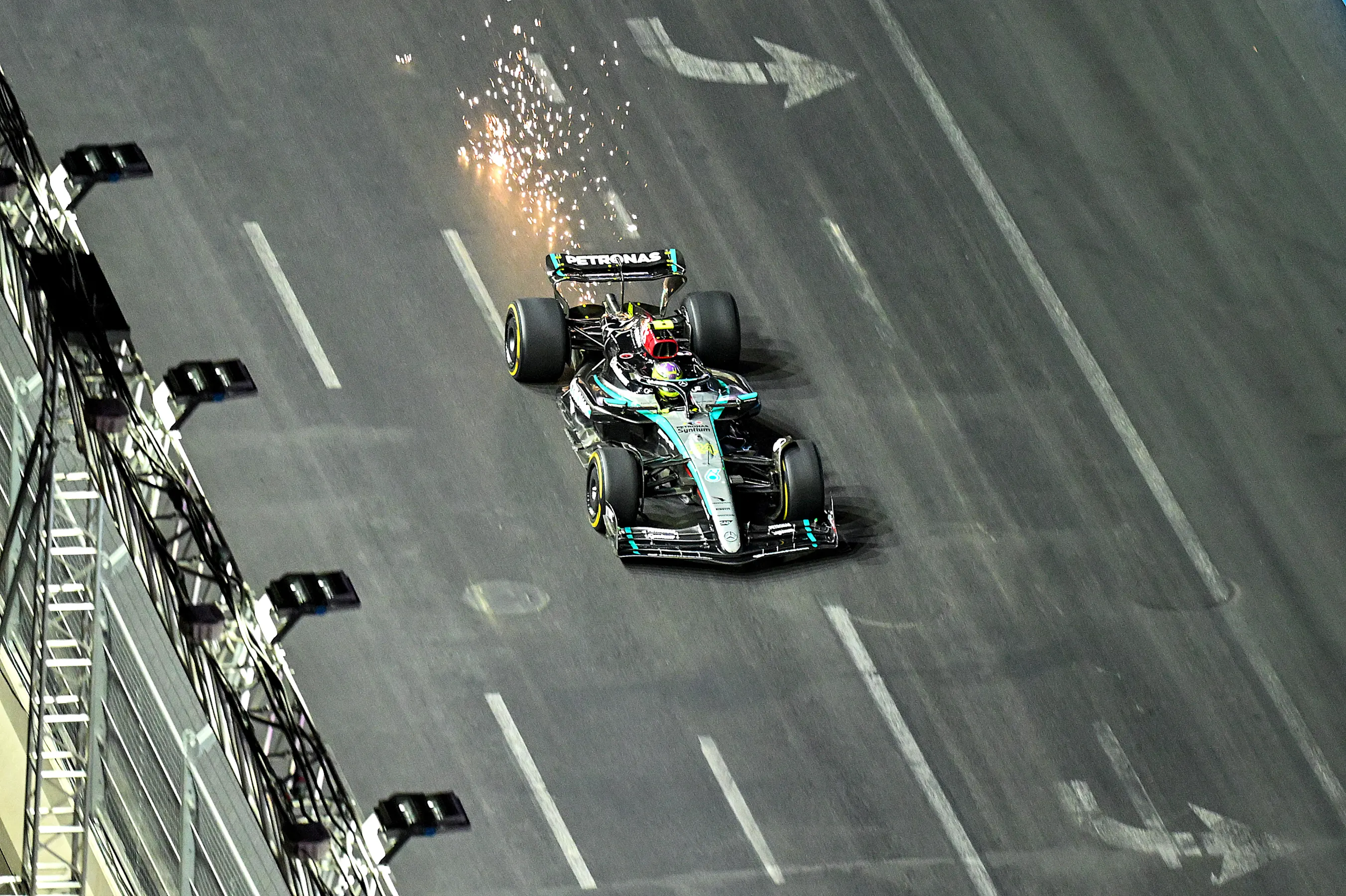LAS VEGAS, NEVADA - NOVEMBER 23: Sparks fly from the car of Lewis Hamilton of Great Britain driving