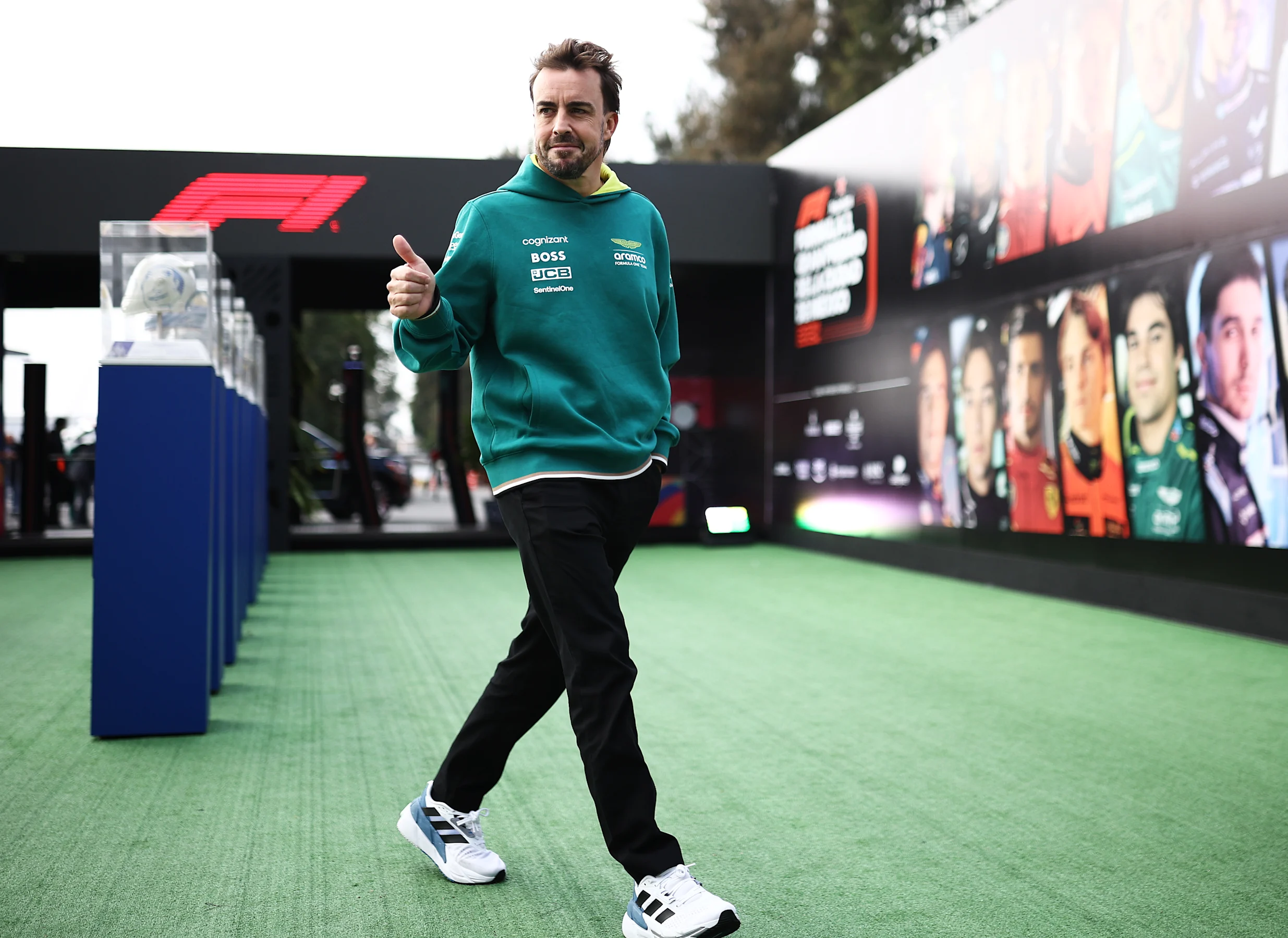 MEXICO CITY, MEXICO - OCTOBER 27: Fernando Alonso of Spain and Aston Martin F1 Team walks in the