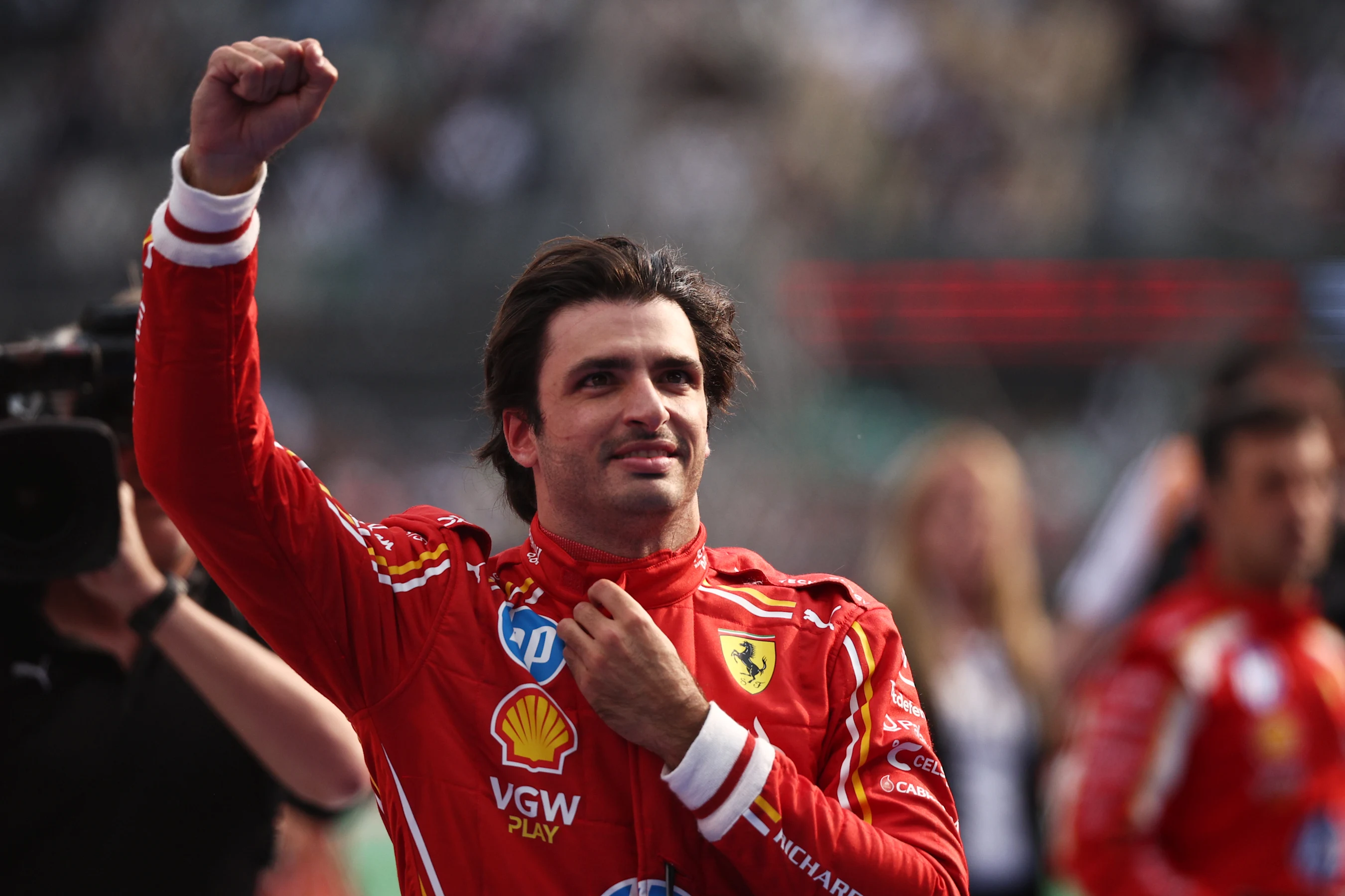 MEXICO CITY, MEXICO - OCTOBER 27: Race winner Carlos Sainz of Spain and Ferrari celebrates in parc