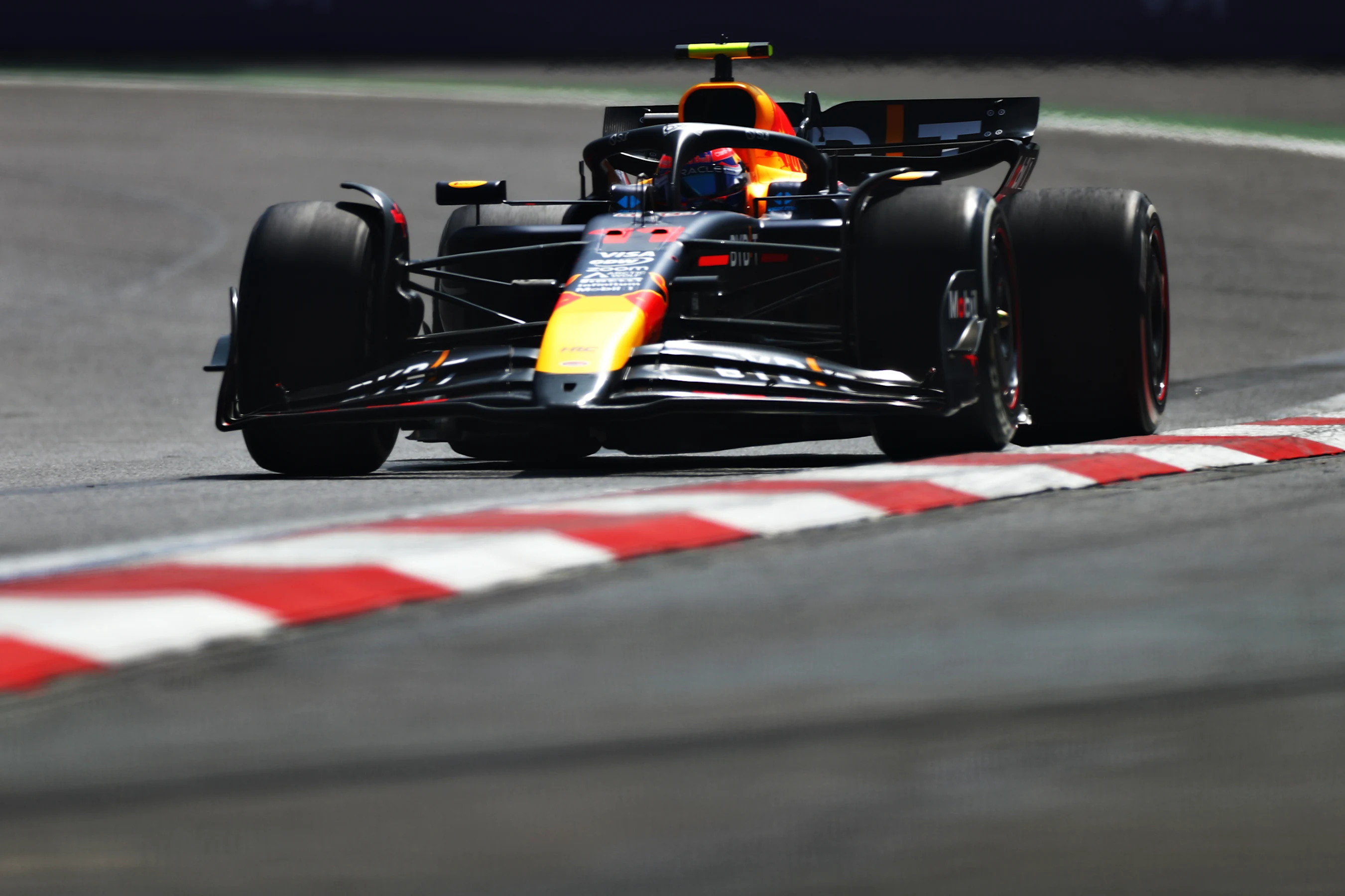 MEXICO CITY, MEXICO - OCTOBER 25: Sergio Perez of Mexico driving the (11) Oracle Red Bull Racing