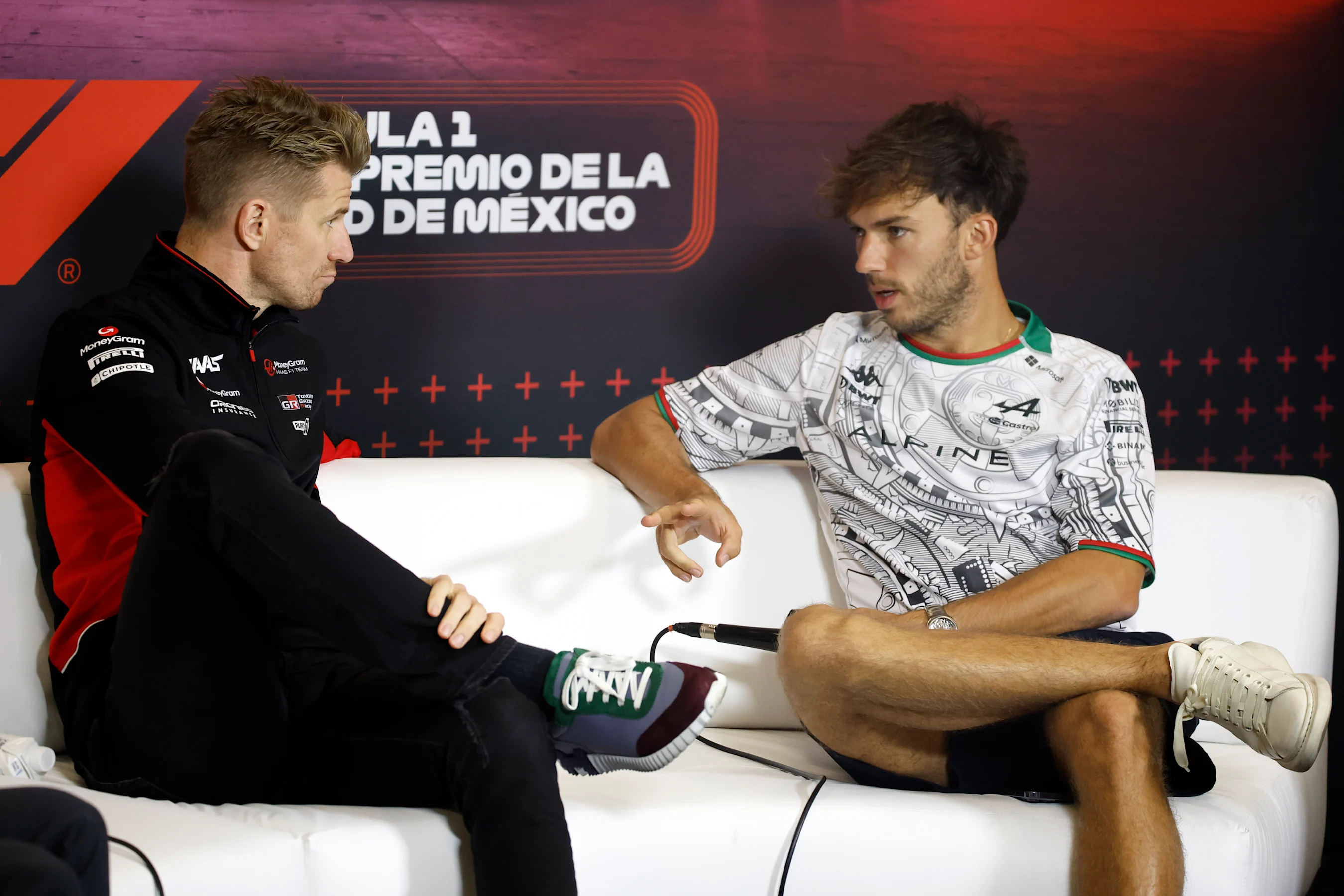 MEXICO CITY, MEXICO - OCTOBER 24: Nico Hulkenberg of Germany and Haas F1 and Pierre Gasly of France