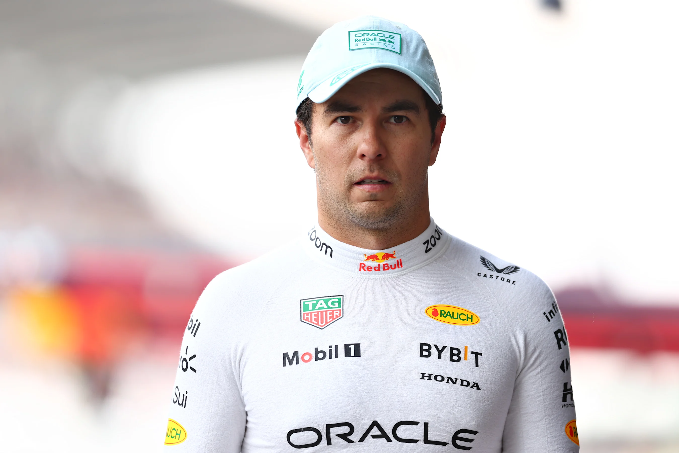 MEXICO CITY, MEXICO - OCTOBER 26: 18th placed qualifier Sergio Perez of Mexico and Oracle Red Bull