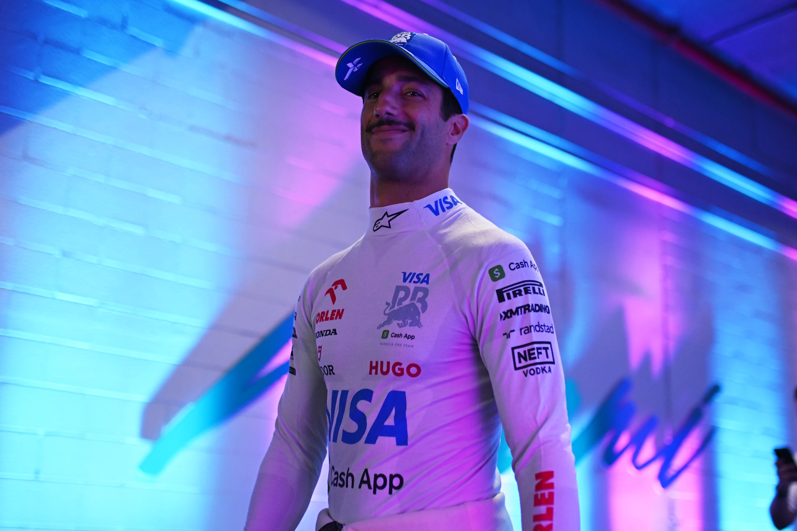 MIAMI, FLORIDA - MAY 03: Daniel Ricciardo of Australia and Visa Cash App RB walks to the garage