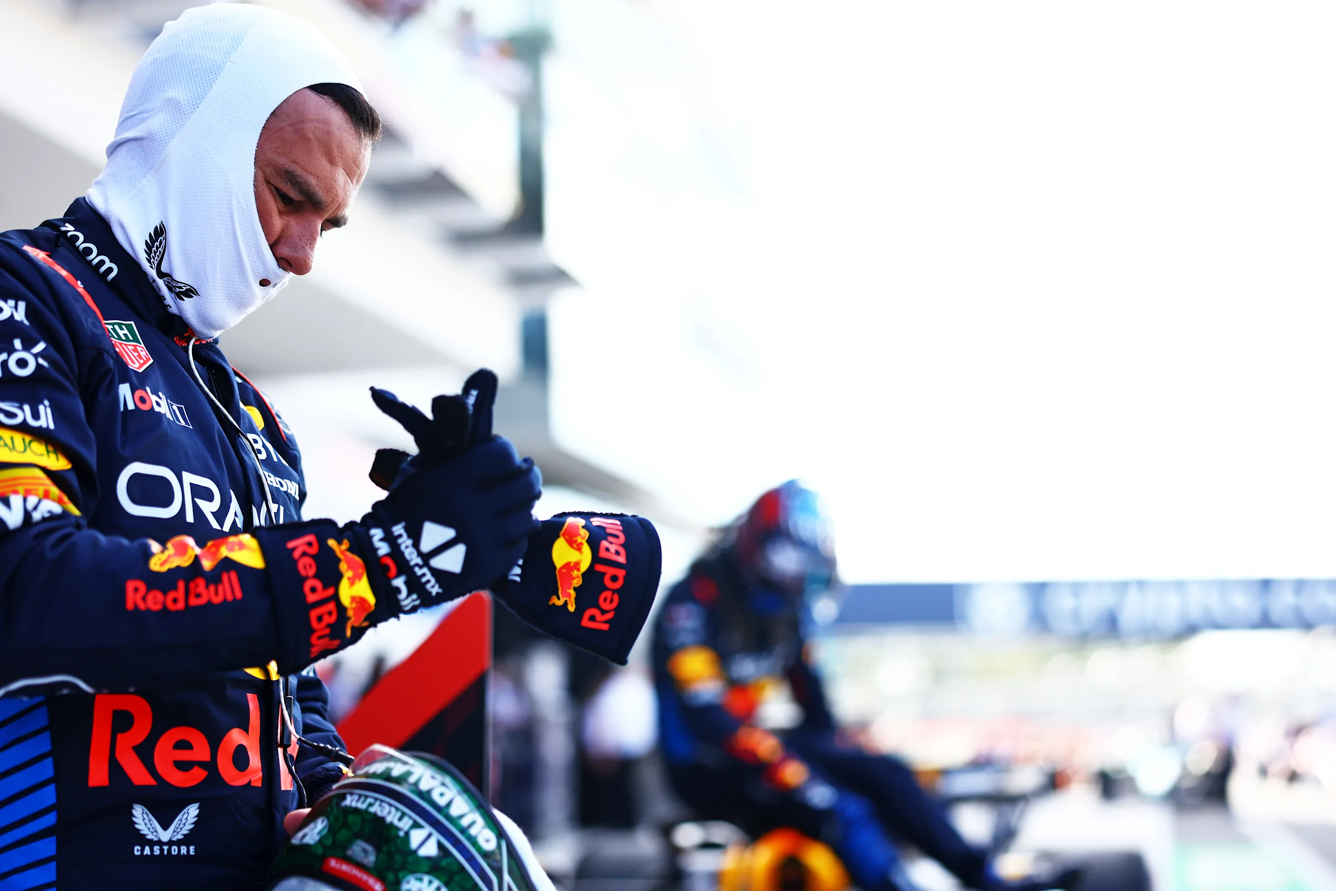 MIAMI, FLORIDA - MAY 03: Third placed qualifier Sergio Perez of Mexico and Oracle Red Bull Racing