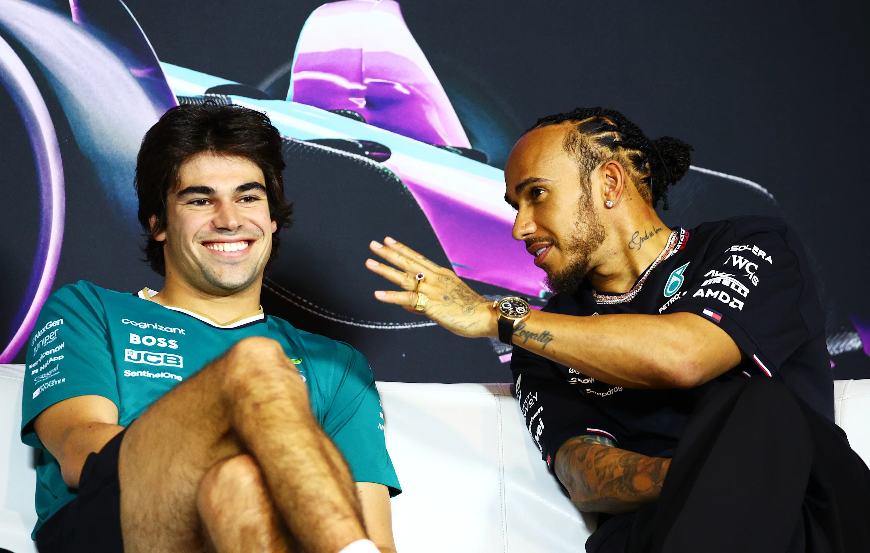 MIAMI, FLORIDA - MAY 02: Lance Stroll of Canada and Aston Martin F1 Team and Lewis Hamilton of