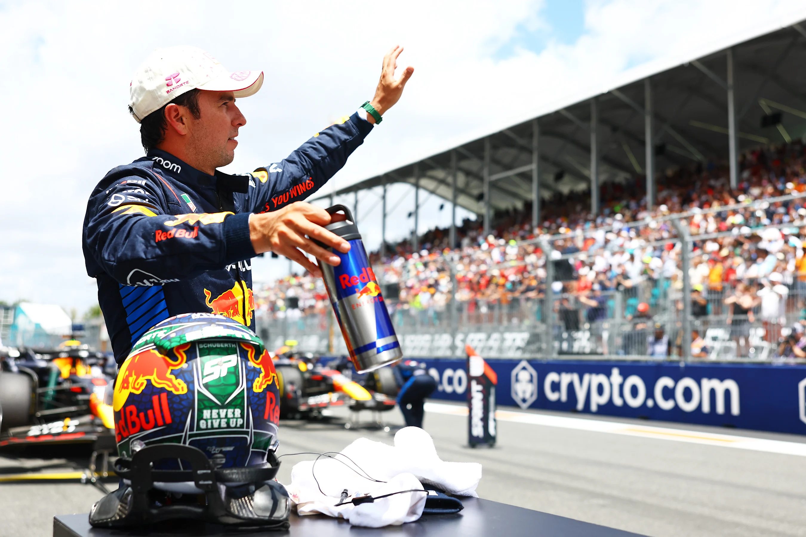 MIAMI, FLORIDA - MAY 04: Third placed Sergio Perez of Mexico and Oracle Red Bull Racing celebrates