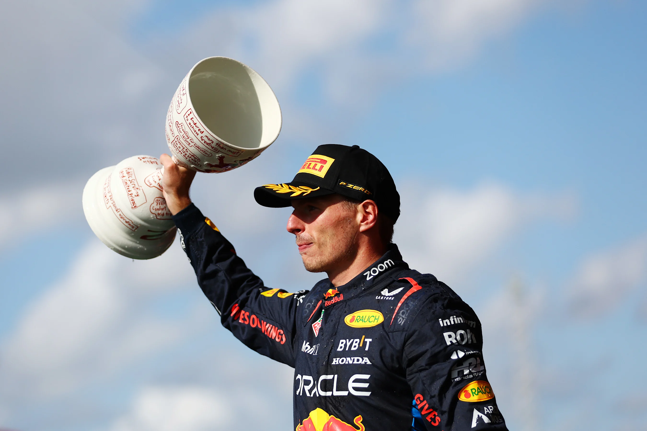 ZANDVOORT, NETHERLANDS - AUGUST 25: Second placed Max Verstappen of the Netherlands and Oracle Red
