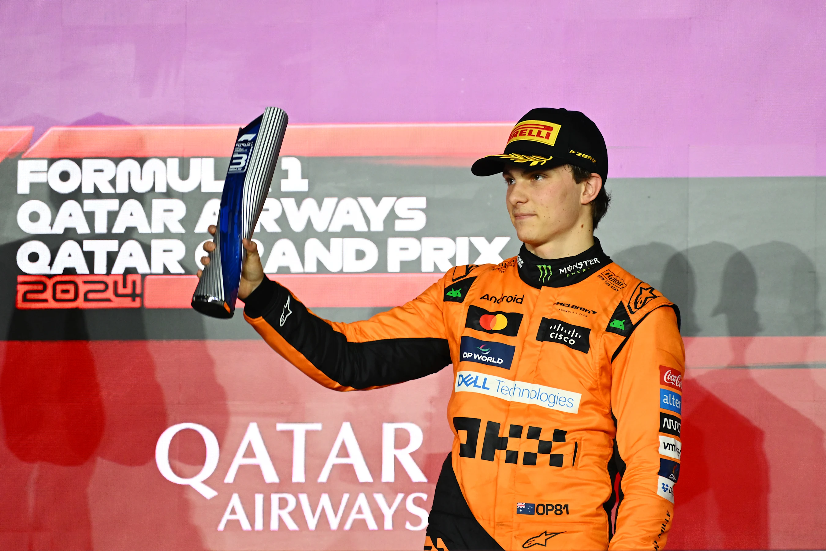 LUSAIL CITY, QATAR - DECEMBER 01: Third placed Oscar Piastri of Australia and McLaren celebrates on
