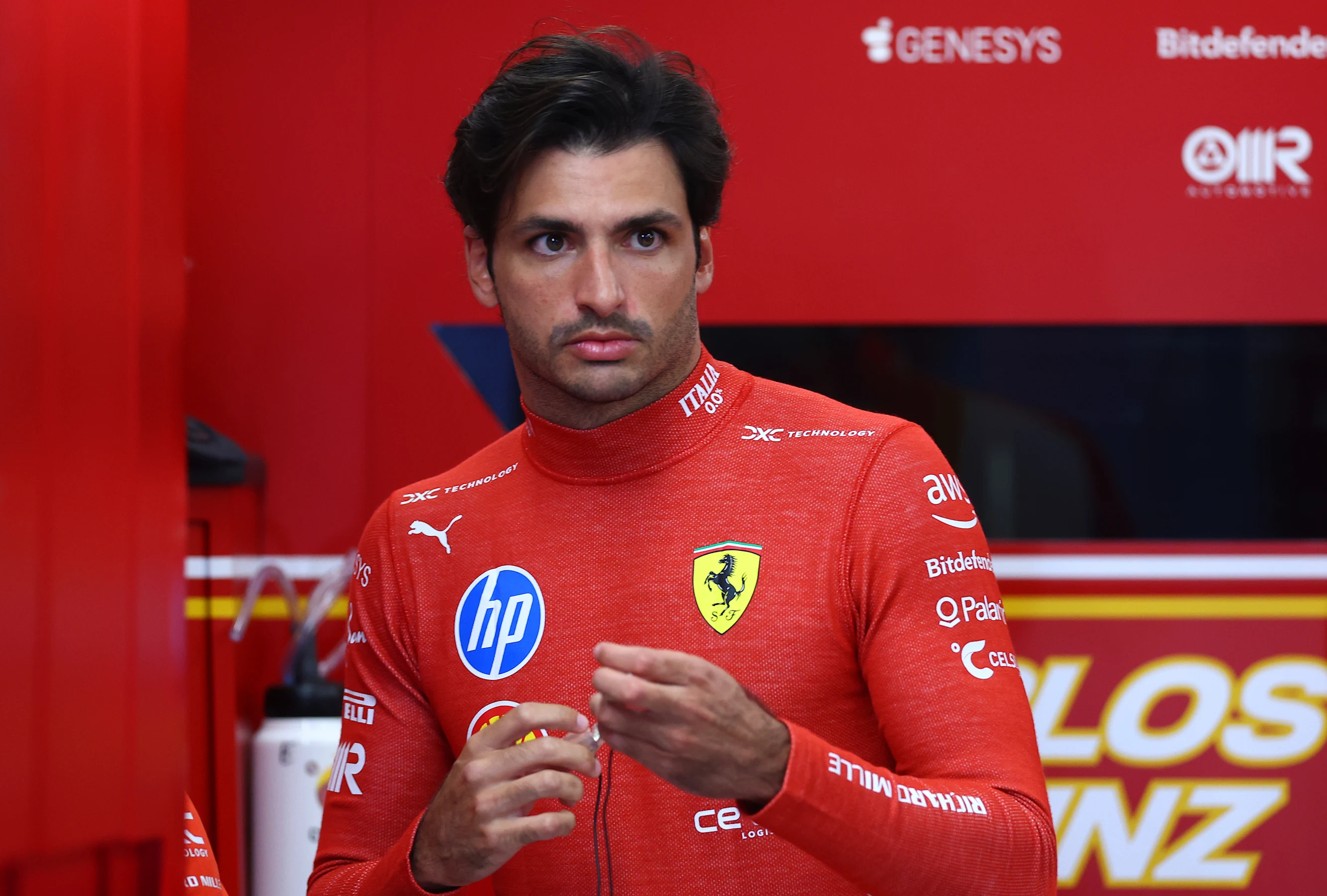 LUSAIL CITY, QATAR - NOVEMBER 29: Carlos Sainz of Spain and Ferrari prepares to drive in the garage