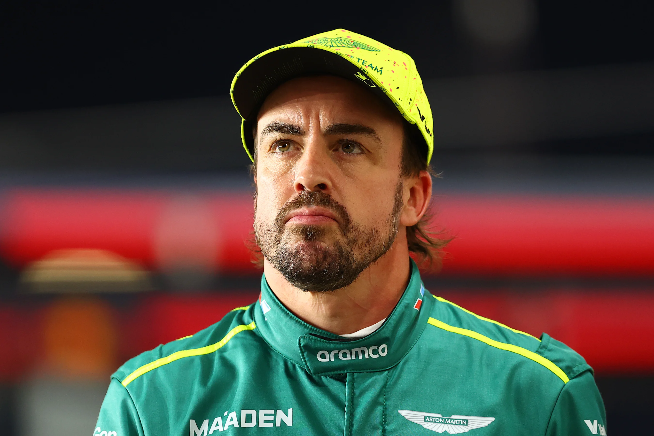 LUSAIL CITY, QATAR - NOVEMBER 29: 11th placed qualifier Fernando Alonso of Spain and Aston Martin