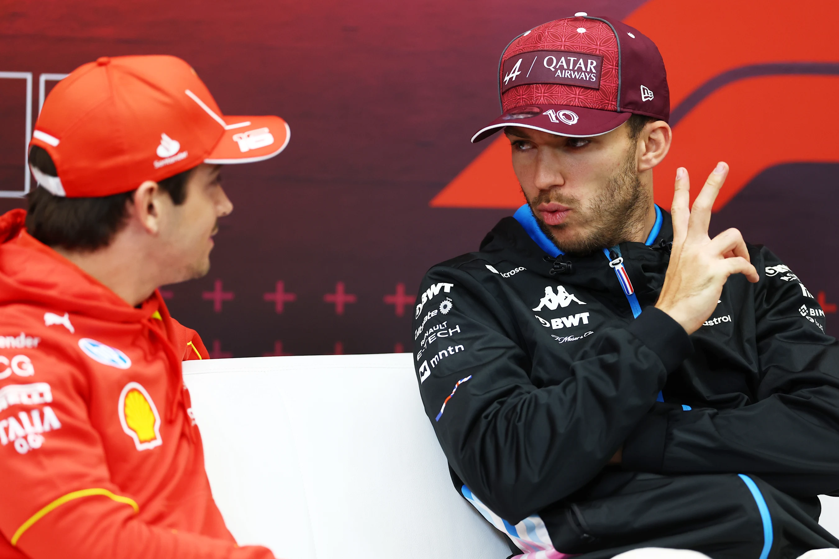 LUSAIL CITY, QATAR - NOVEMBER 28: Charles Leclerc of Monaco and Ferrari and Pierre Gasly of France
