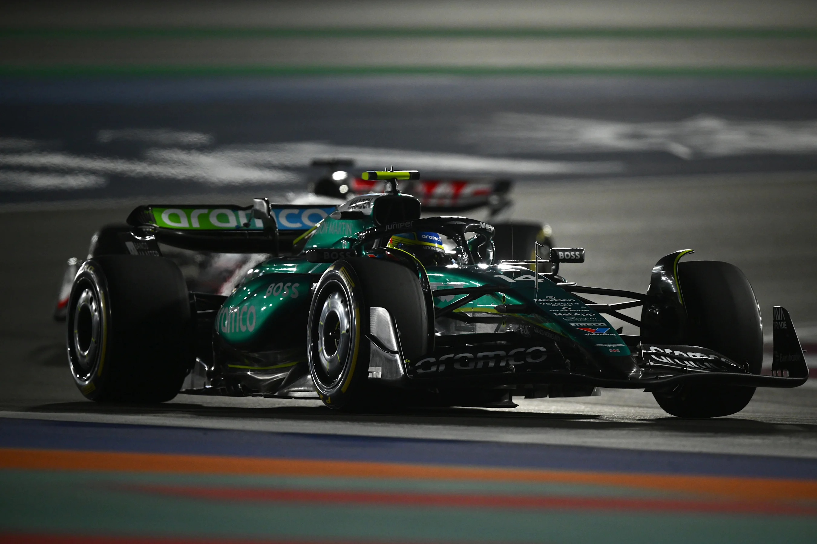 LUSAIL CITY, QATAR - NOVEMBER 30: Fernando Alonso of Spain driving the (14) Aston Martin AMR24