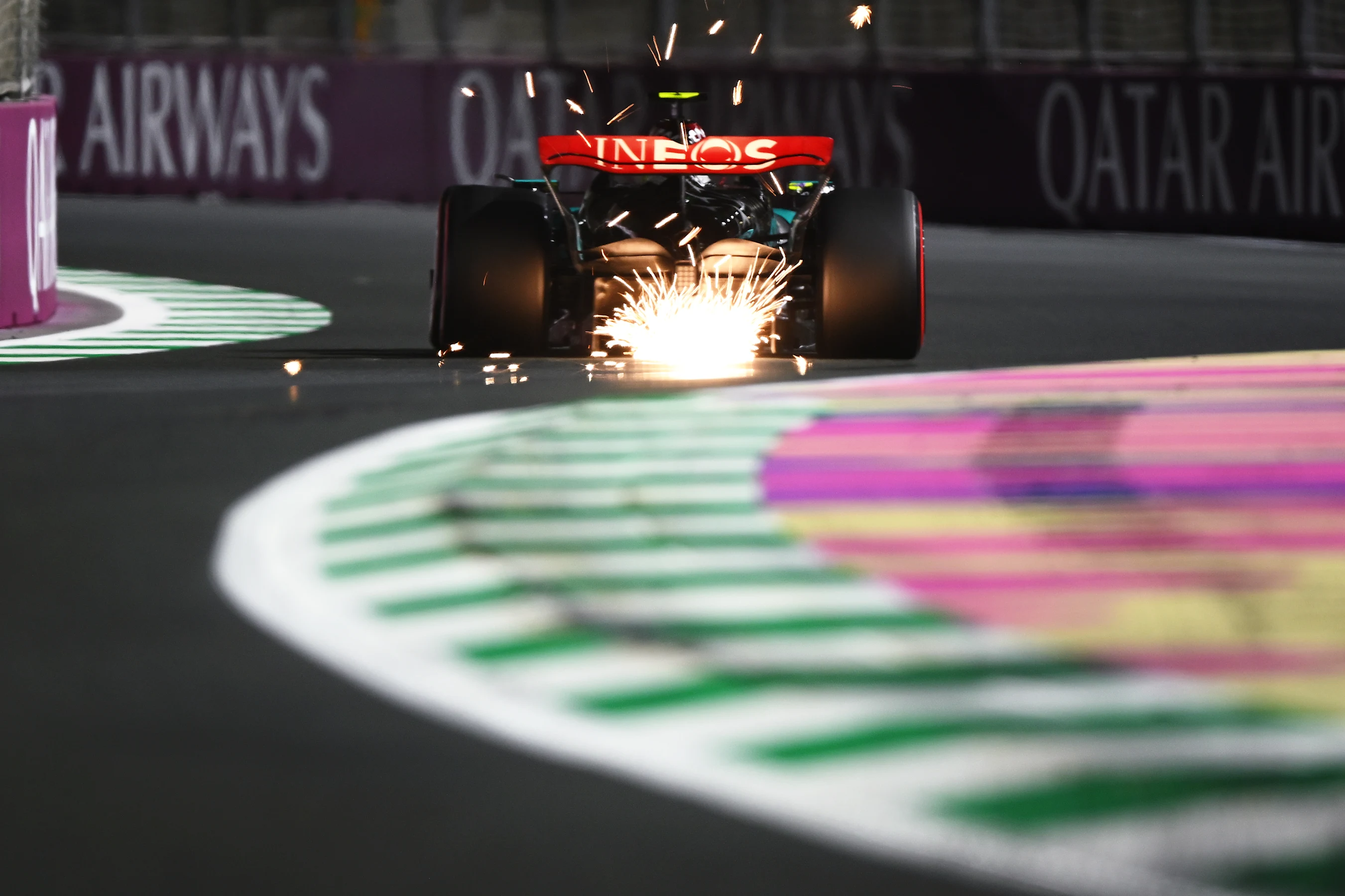 JEDDAH, SAUDI ARABIA - MARCH 08: Sparks fly behind Lewis Hamilton of Great Britain driving the (44)