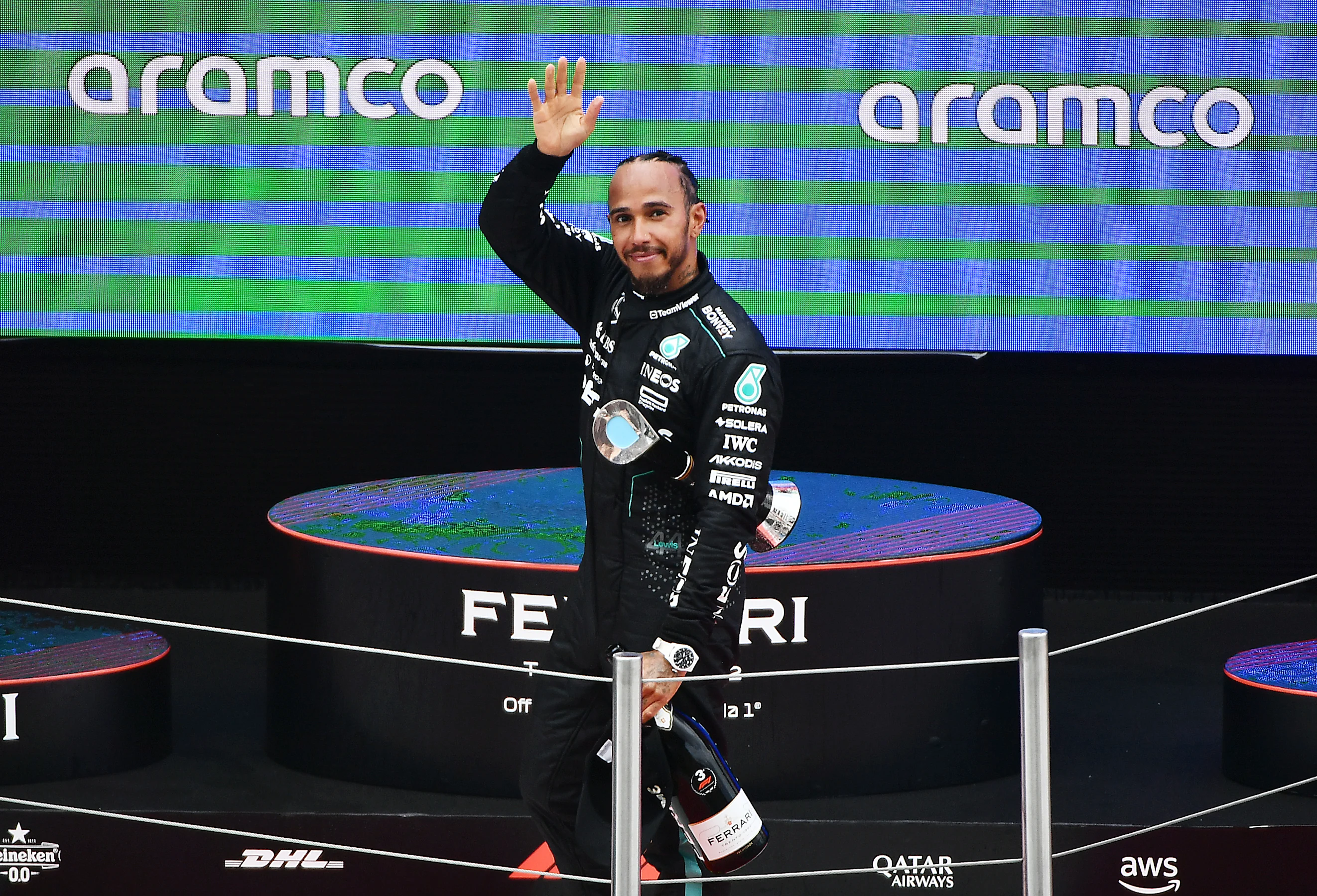 BARCELONA, SPAIN - JUNE 23: Third placed Lewis Hamilton of Great Britain and Mercedes celebrates on