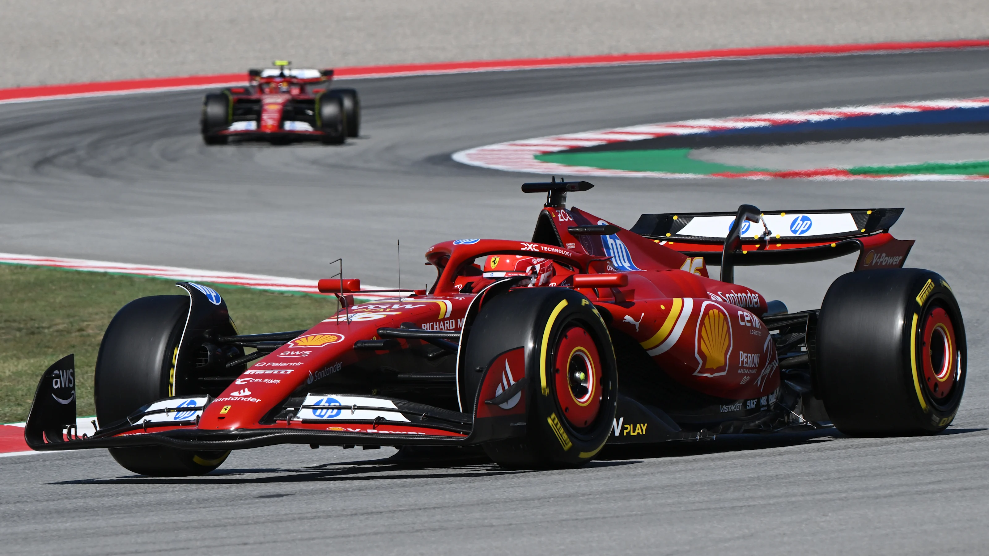 BARCELONA, SPAIN - JUNE 21: Charles Leclerc of Monaco driving the (16) Ferrari SF-24 leads Carlos