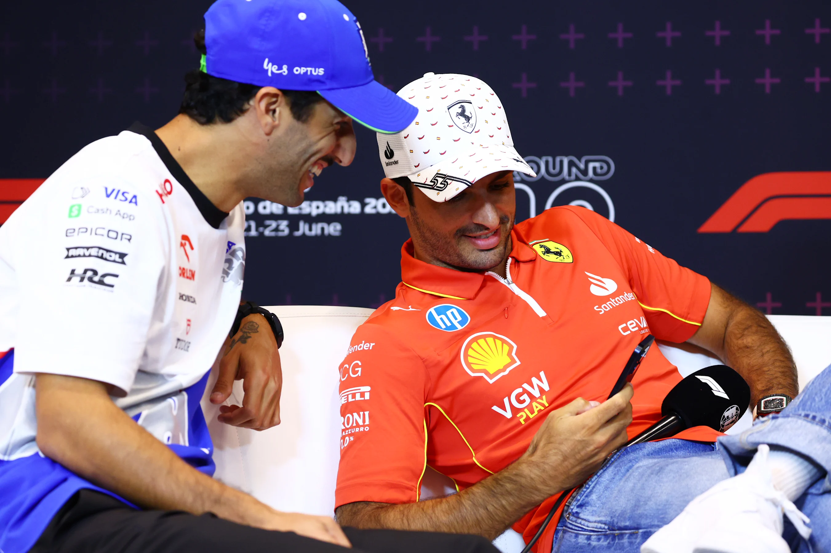 BARCELONA, SPAIN - JUNE 20: Carlos Sainz of Spain and Ferrari and Daniel Ricciardo of Australia and