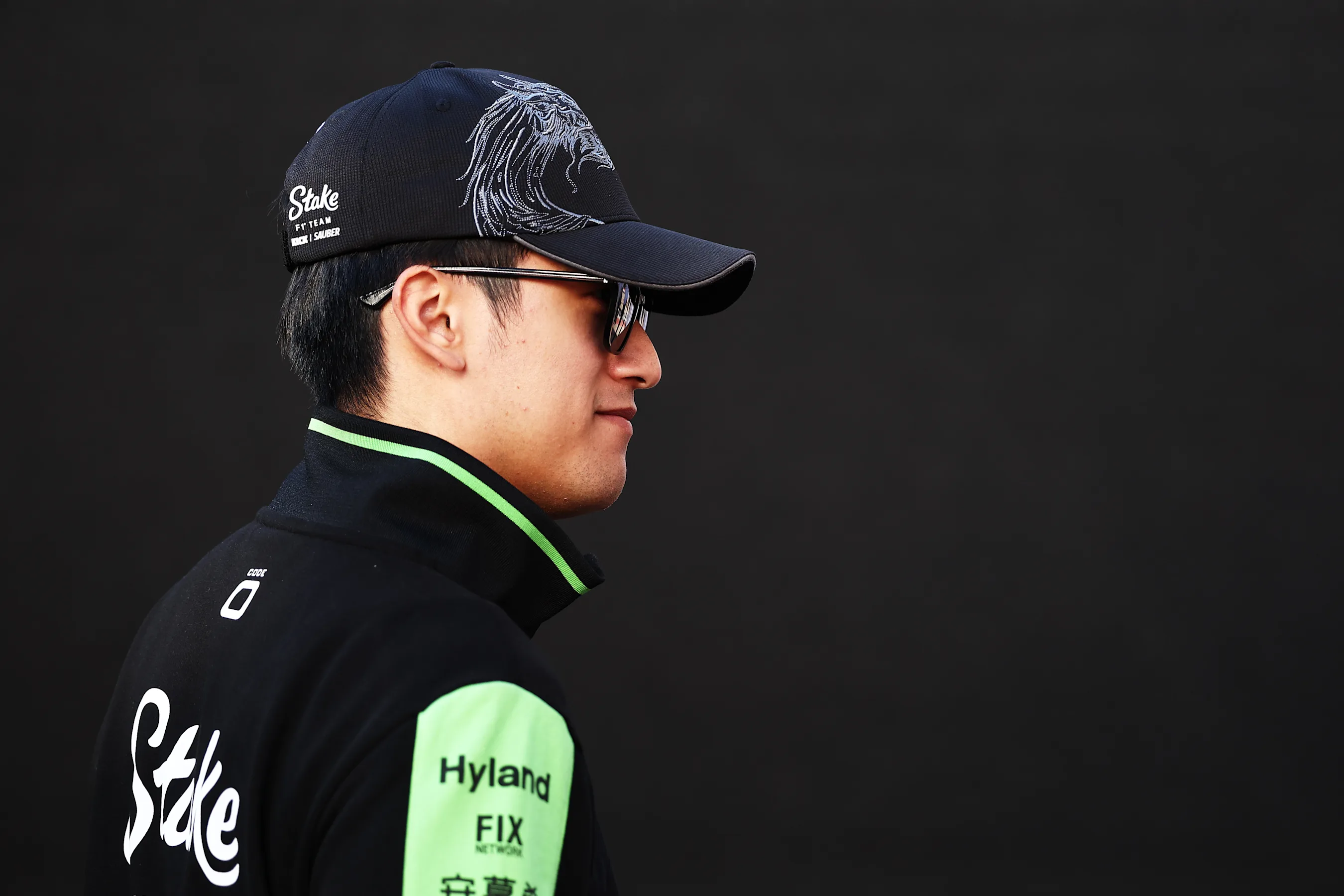 AUSTIN, TEXAS - OCTOBER 20: Zhou Guanyu of China and Stake F1 Team Kick Sauber walks in the Paddock