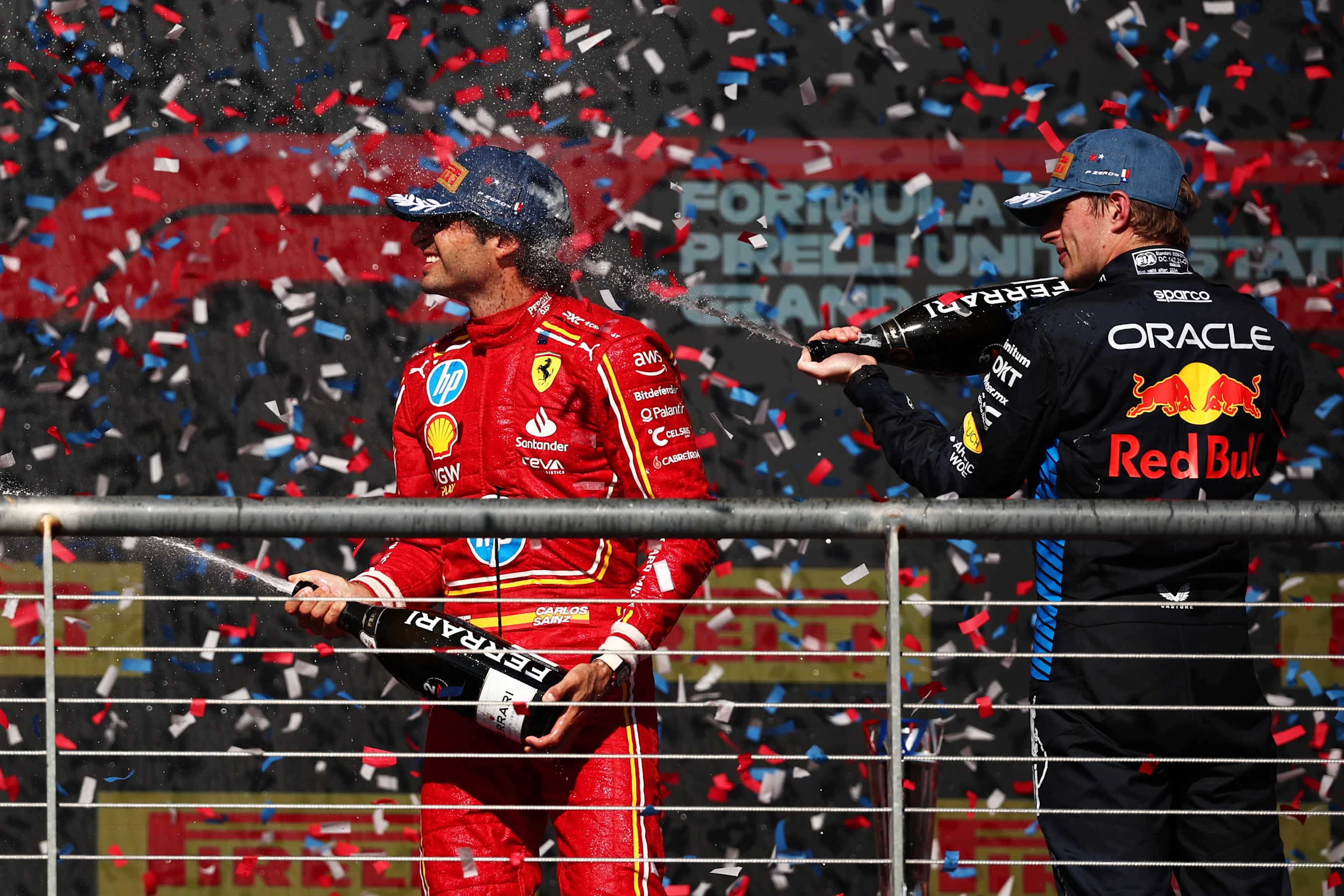 AUSTIN, TEXAS - OCTOBER 20: Second placed Carlos Sainz of Spain and Ferrari and Third placed Max