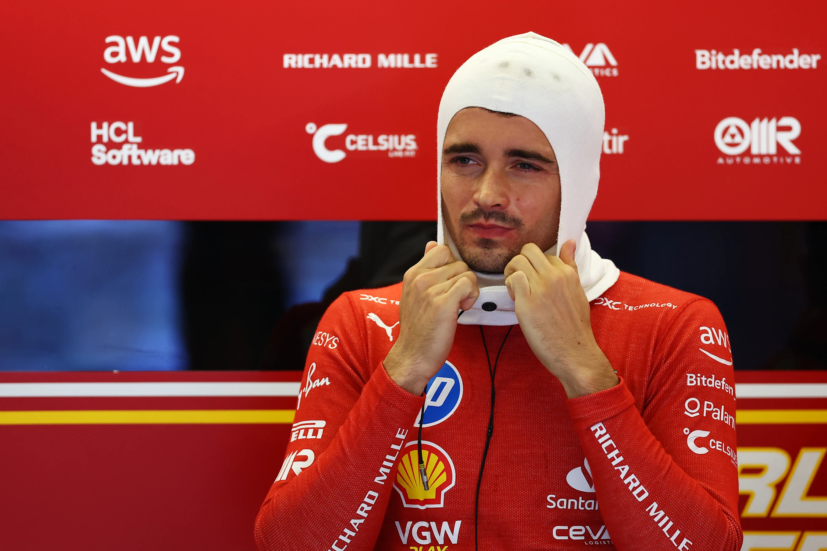 AUSTIN, TEXAS - OCTOBER 19: Charles Leclerc of Monaco and Ferrari prepares to drive in the garage