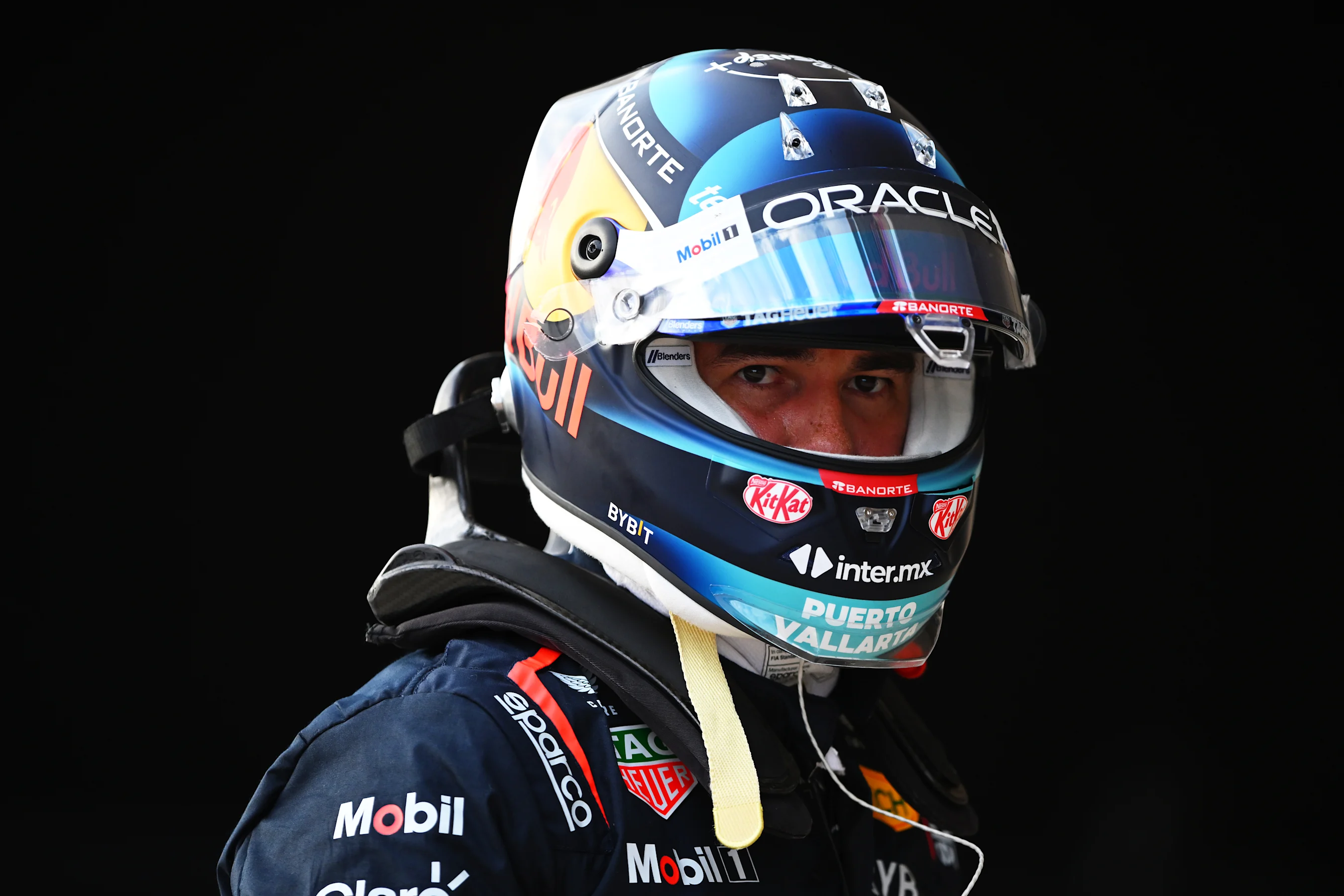 AUSTIN, TEXAS - OCTOBER 19: 10th placed qualifier Sergio Perez of Mexico and Oracle Red Bull Racing