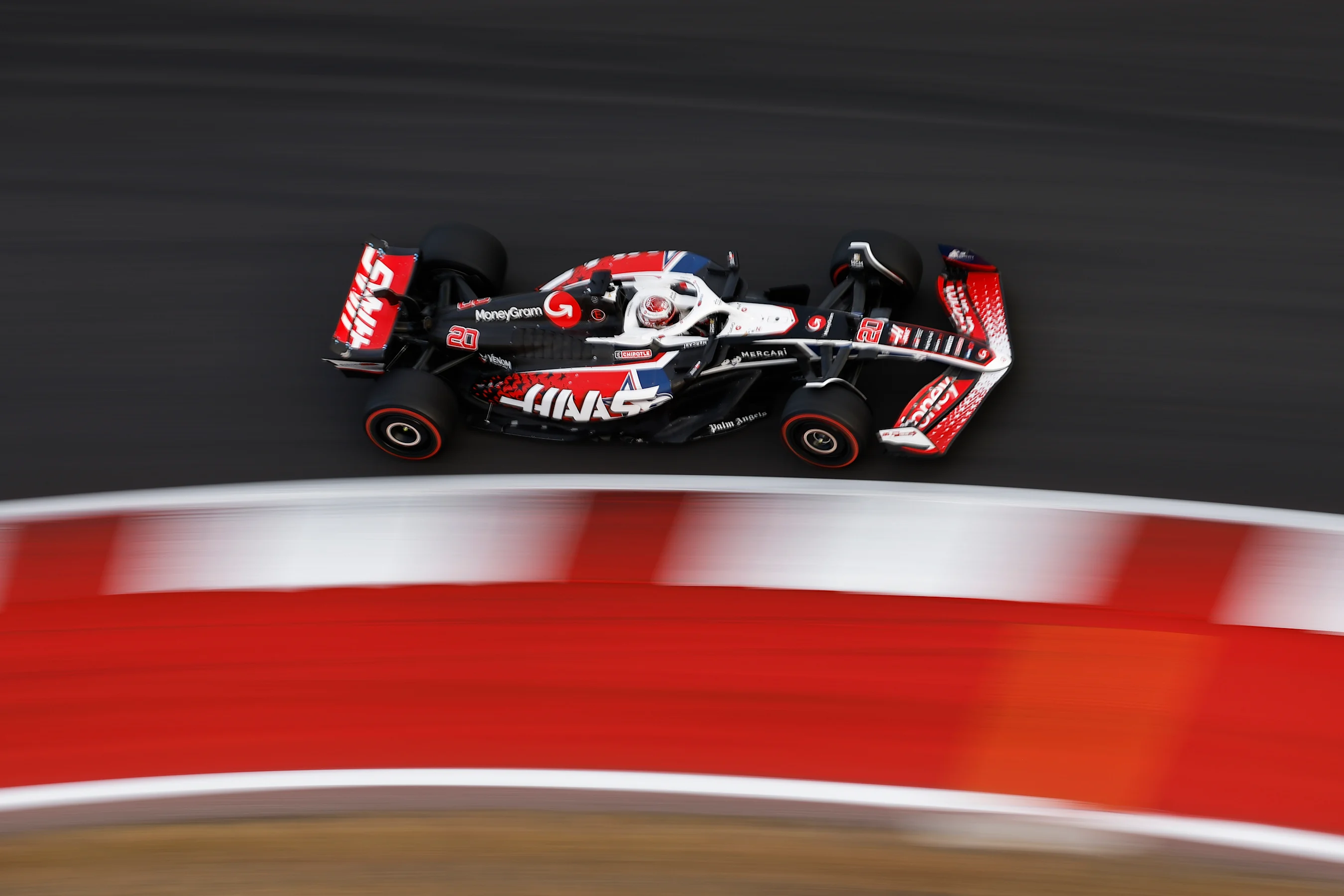 AUSTIN, TEXAS - OCTOBER 19: Kevin Magnussen of Denmark driving the (20) Haas F1 VF-24 Ferrari on