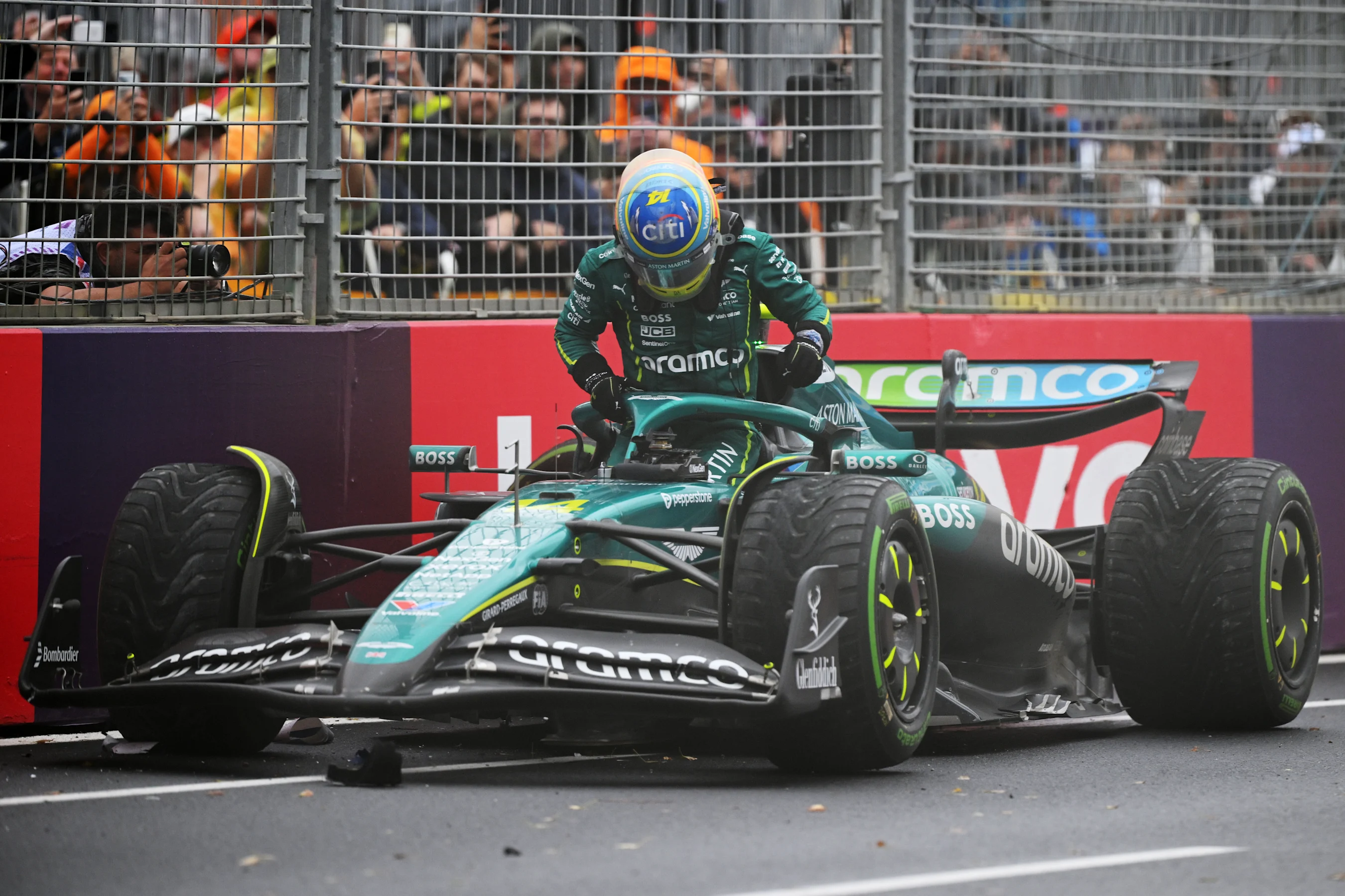 MELBOURNE, AUSTRALIA - MARCH 16: Fernando Alonso of Spain and Aston Martin F1 Team after crashing