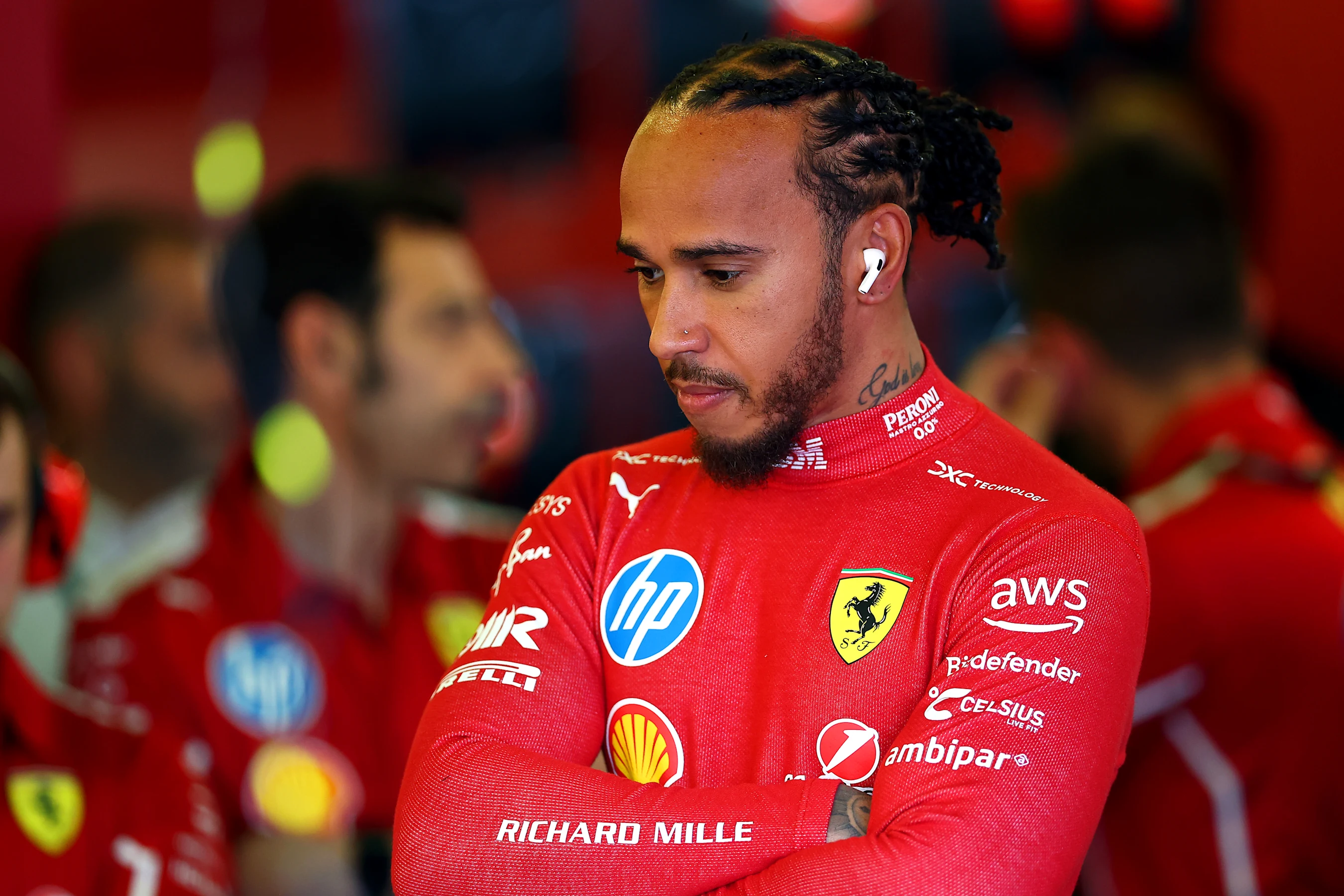 MELBOURNE, AUSTRALIA - MARCH 14: Lewis Hamilton of Great Britain and Scuderia Ferrari prepares to