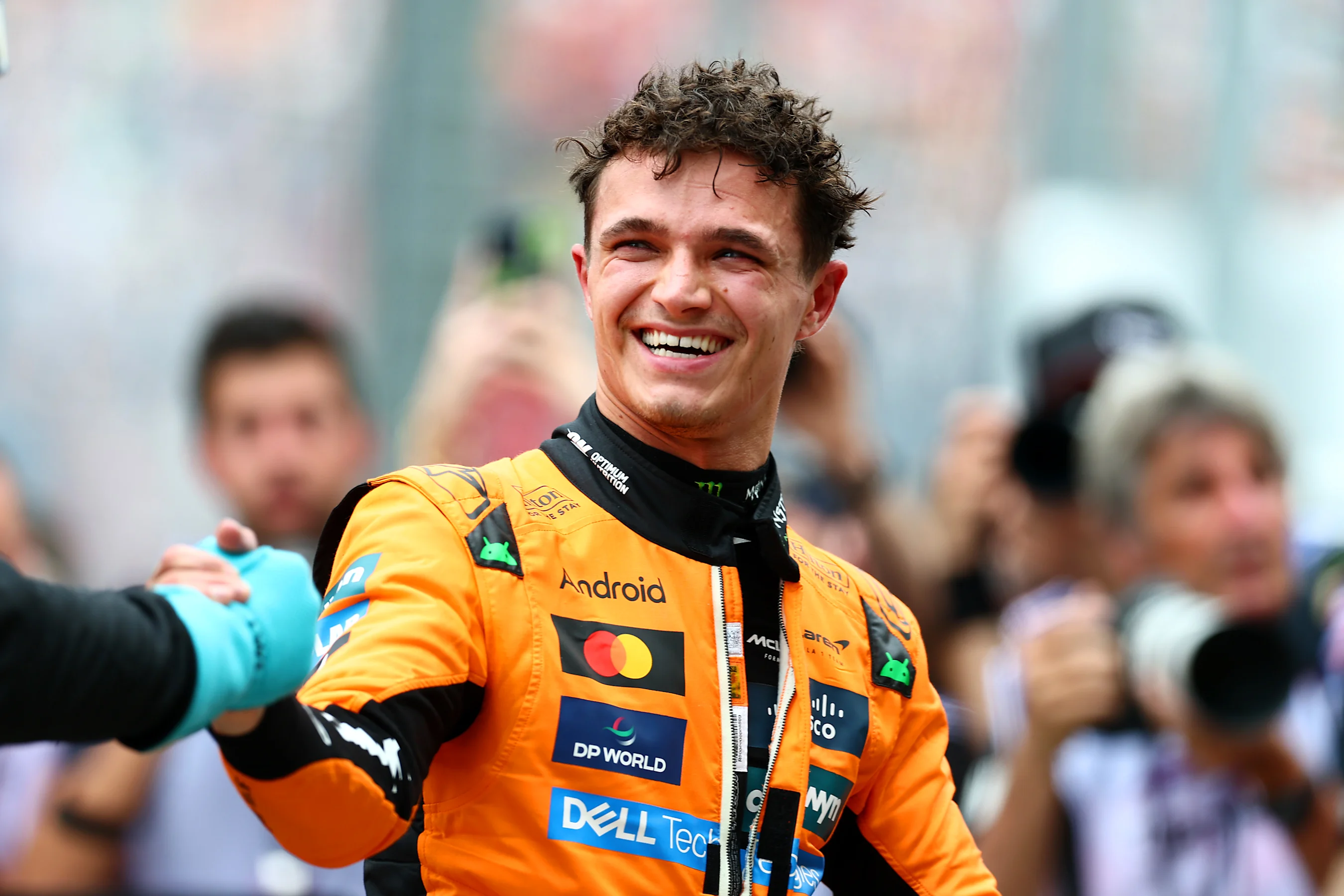 MELBOURNE, AUSTRALIA - MARCH 15: Pole position qualifier Lando Norris of Great Britain and McLaren
