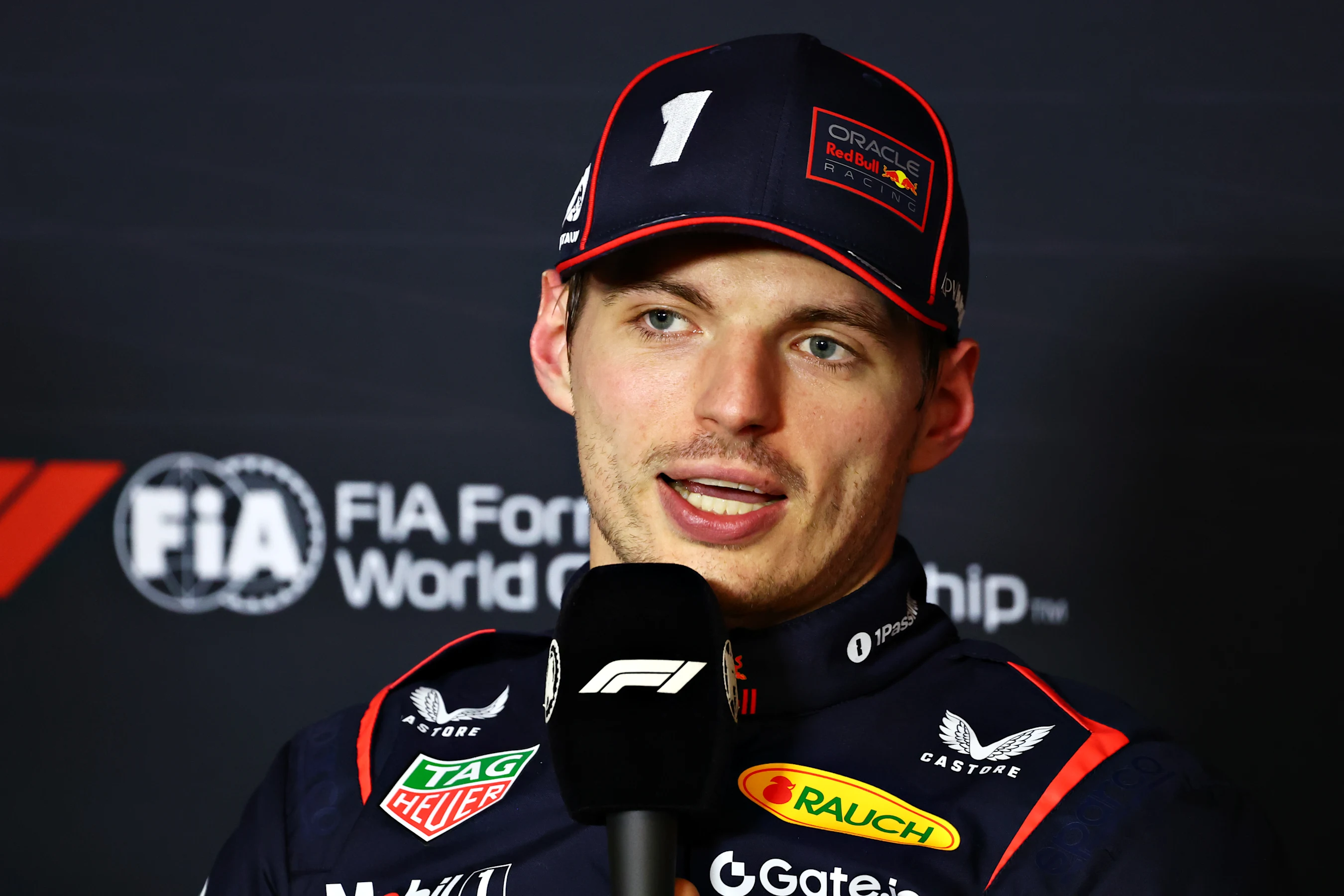 MELBOURNE, AUSTRALIA - MARCH 15: Third placed qualifier Max Verstappen of the Netherlands and