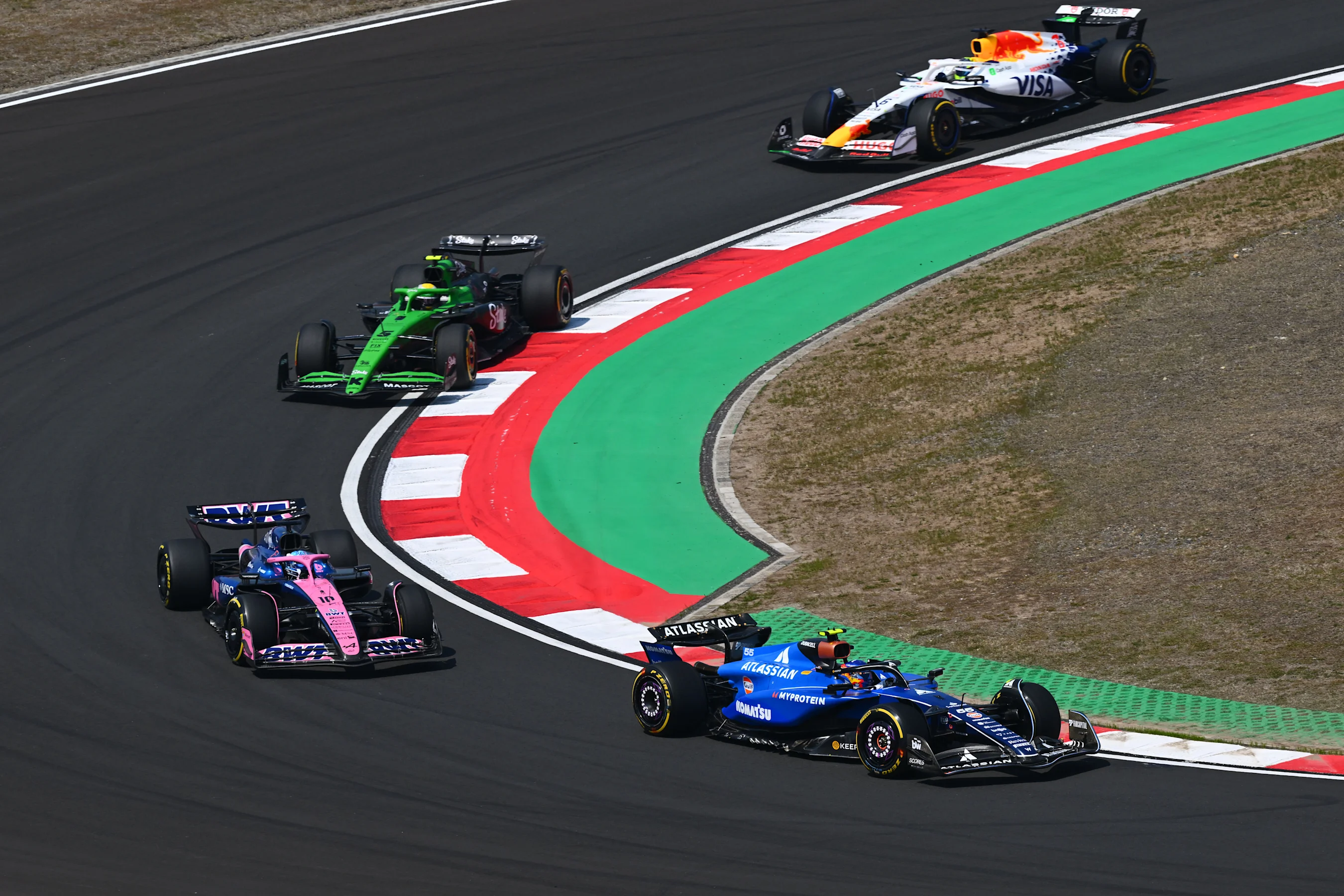 SHANGHAI, CHINA - MARCH 22: Carlos Sainz of Spain driving the (55) Williams FW47 Mercedes leads
