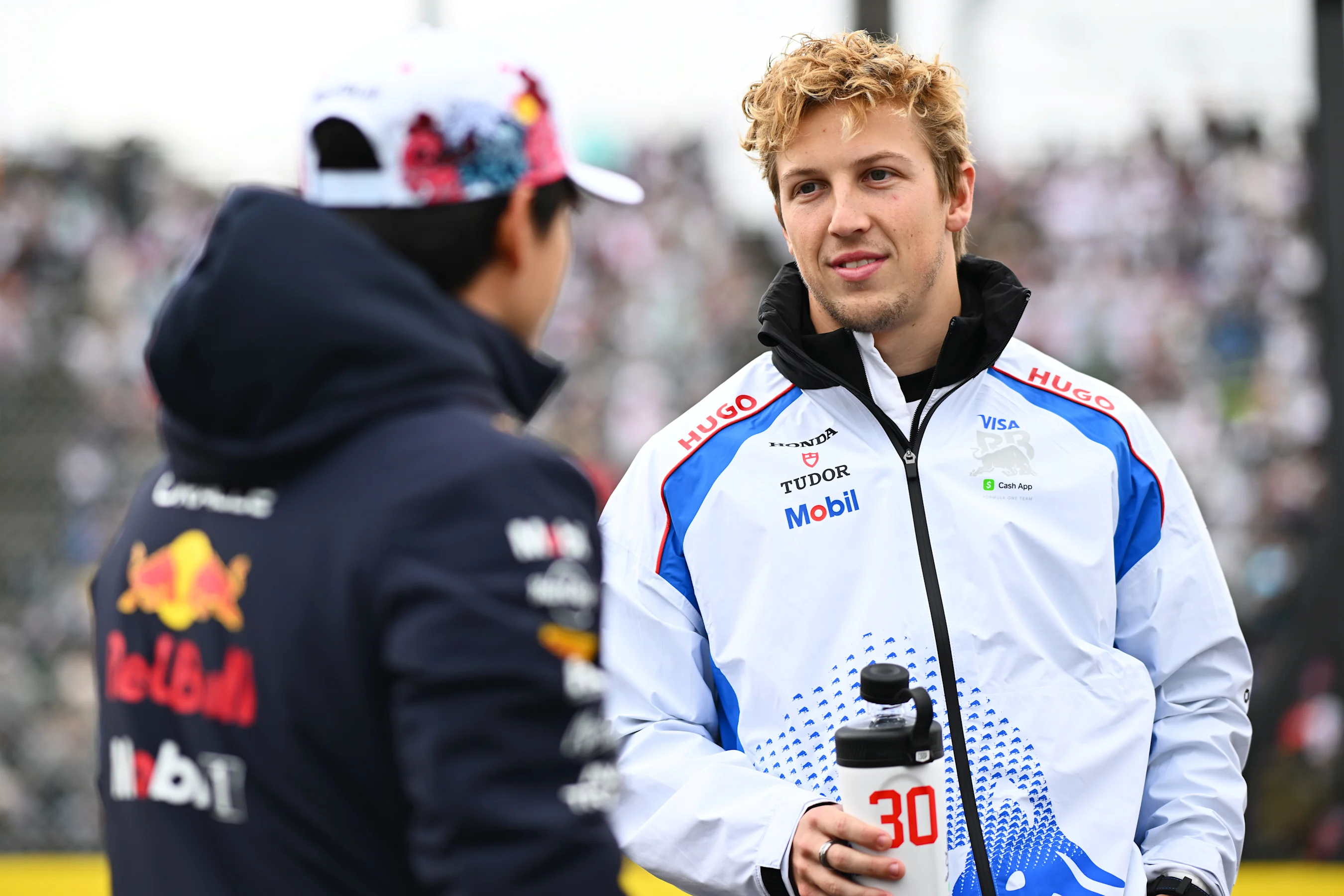 SUZUKA, JAPAN - APRIL 06: Yuki Tsunoda of Japan and Oracle Red Bull Racing and Liam Lawson of New