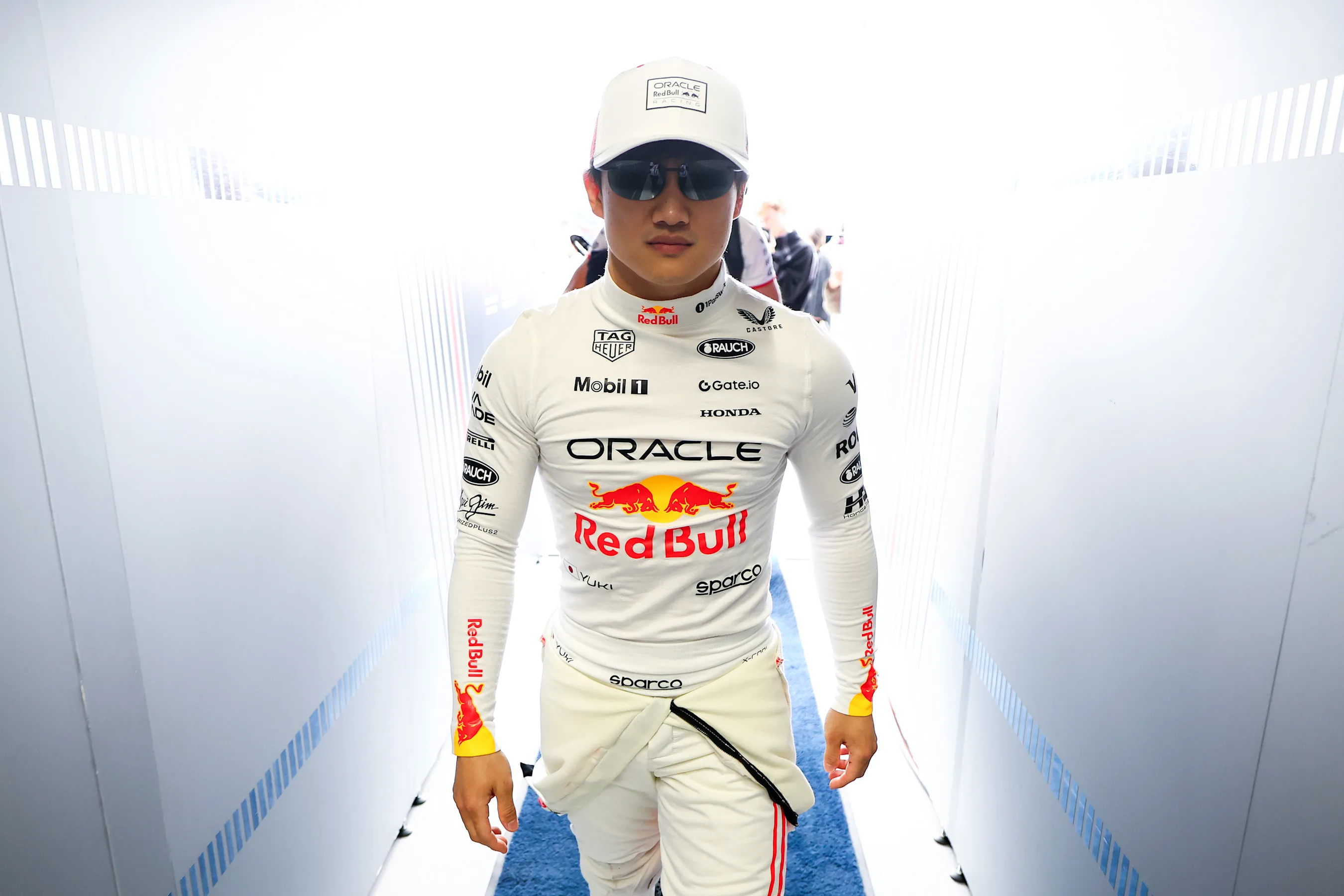 SUZUKA, JAPAN - APRIL 06: Yuki Tsunoda of Japan and Oracle Red Bull Racing walks in the garage