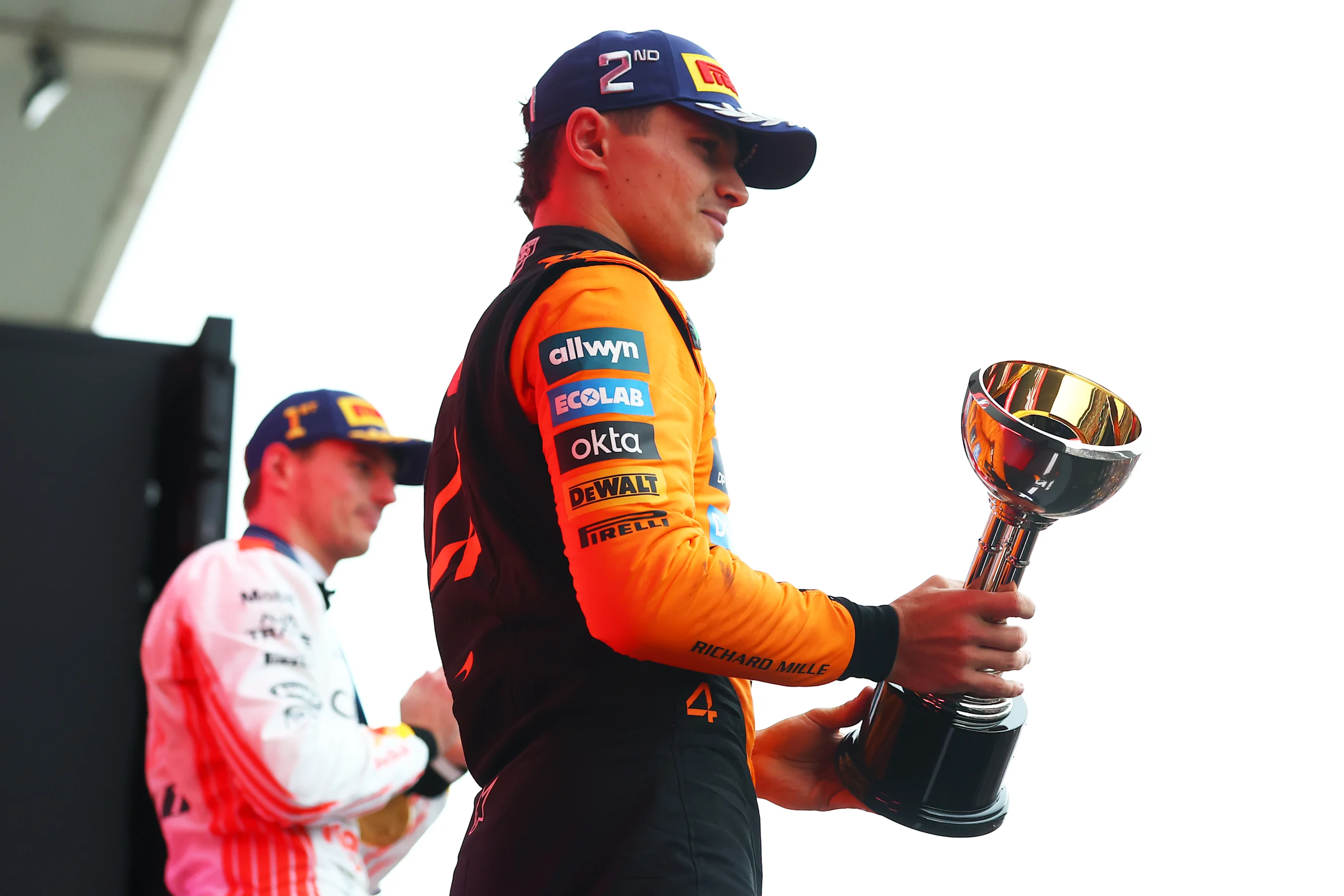 SUZUKA, JAPAN - APRIL 06: Second placed Lando Norris of Great Britain and McLaren on the podium