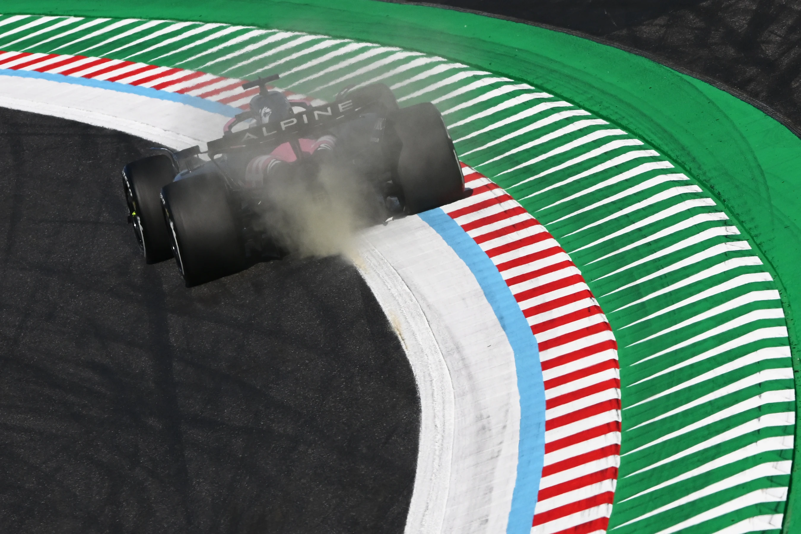 SUZUKA, JAPAN - APRIL 04: Pierre Gasly of France driving the (10) Alpine F1 A525 Renault kicks up