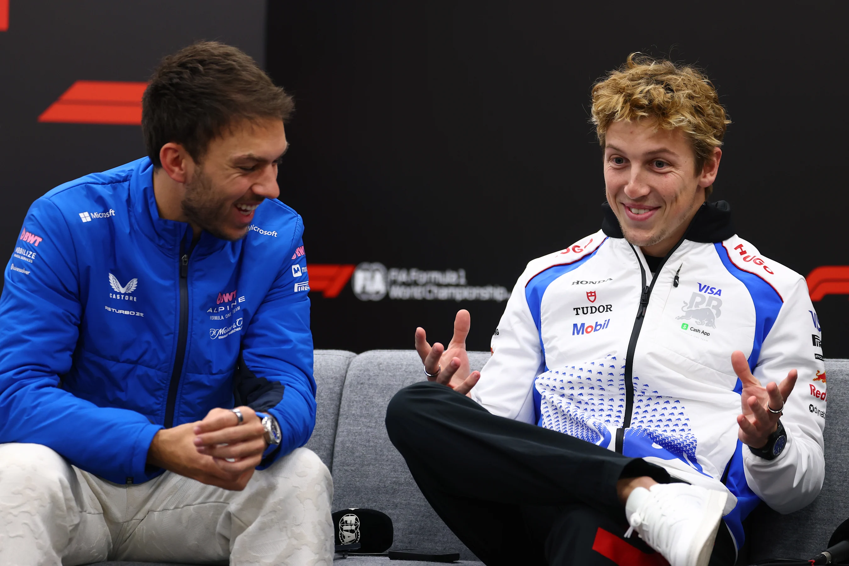 SUZUKA, JAPAN - APRIL 03: Pierre Gasly of France and Alpine F1 and Liam Lawson of New Zealand and