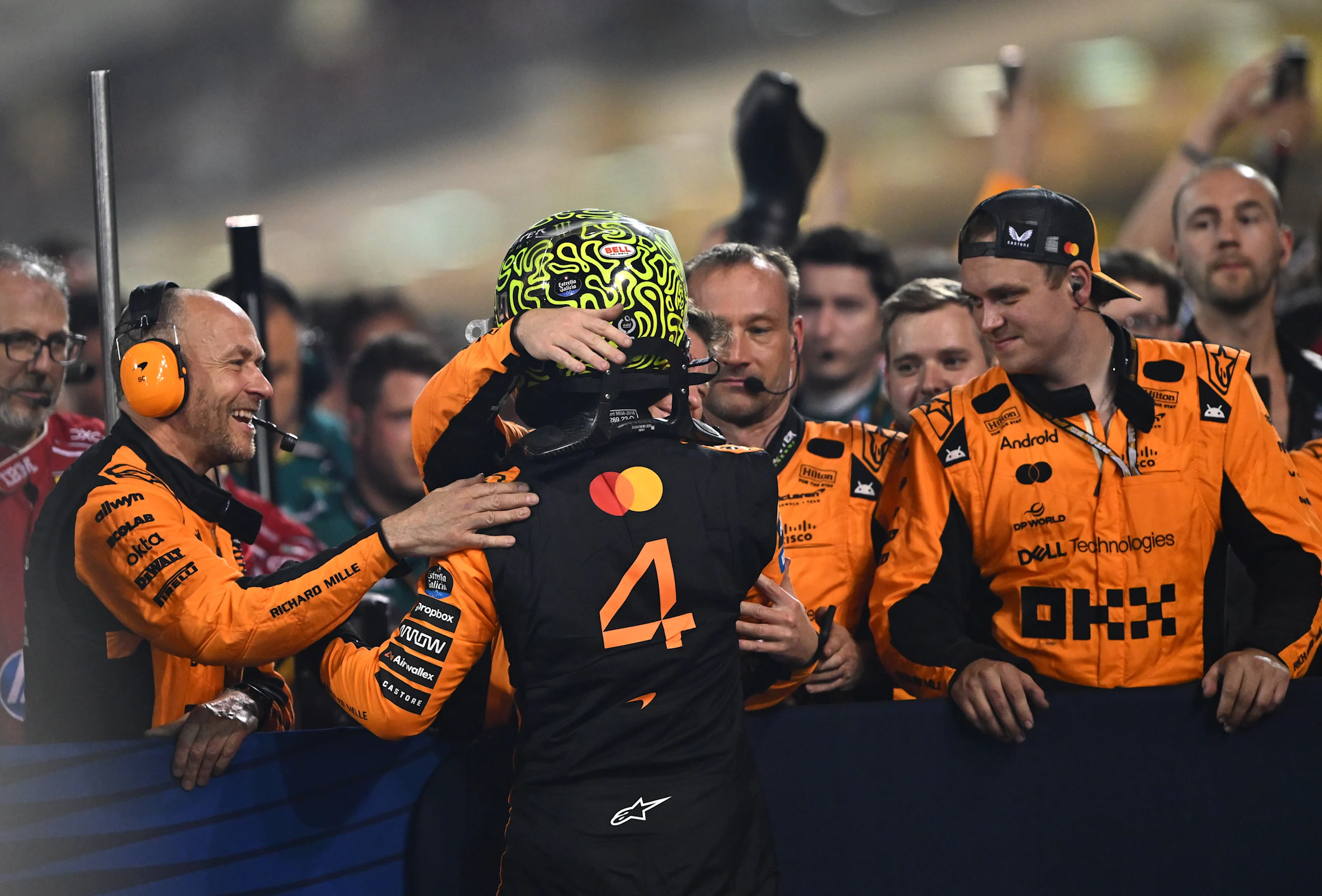 BAHRAIN, BAHRAIN - APRIL 13: Third placed Lando Norris of Great Britain and McLaren celebrates in