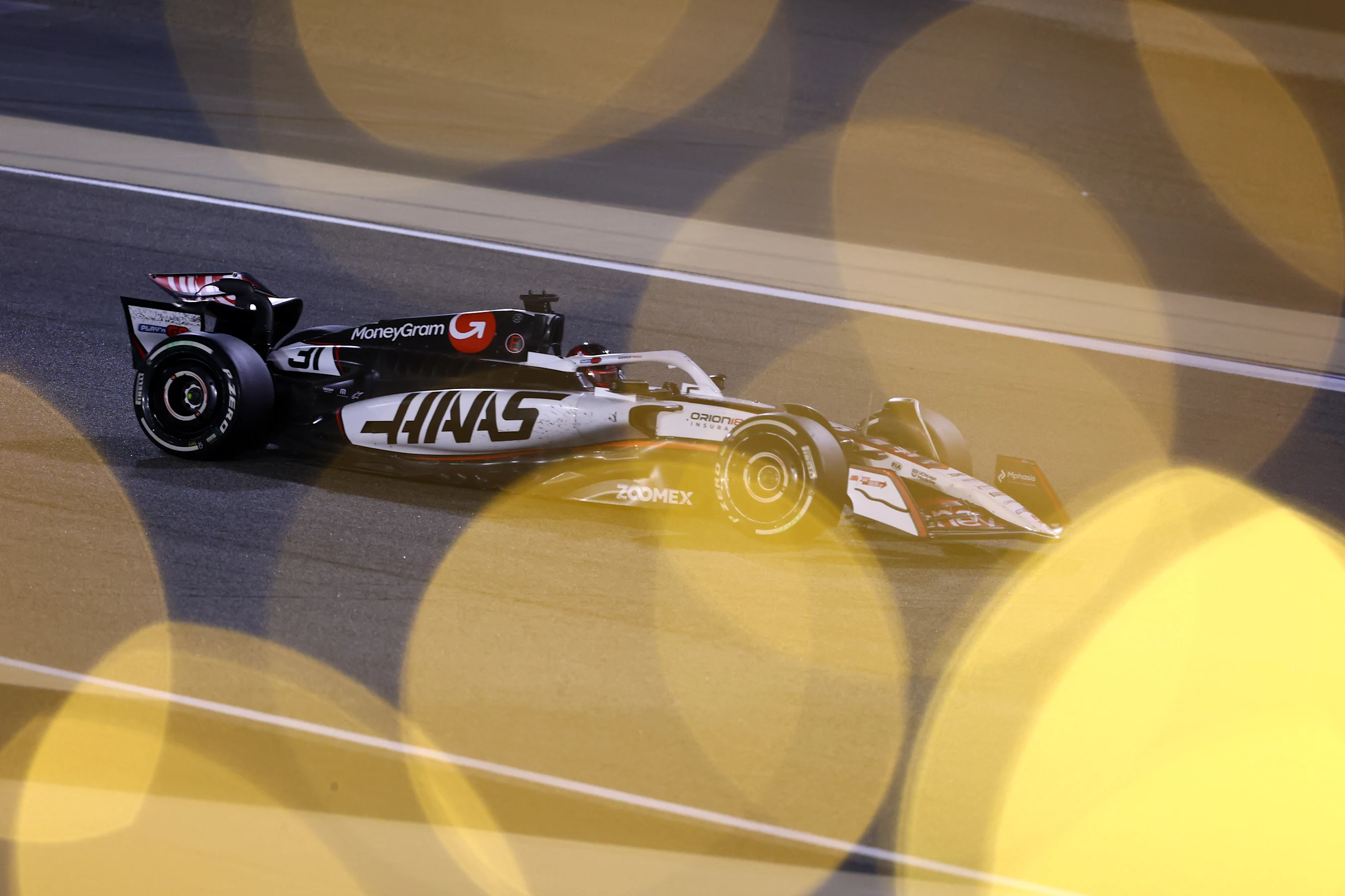 BAHRAIN, BAHRAIN - APRIL 13: Esteban Ocon of France driving the (31) Haas F1 VF-25 Ferrari on track