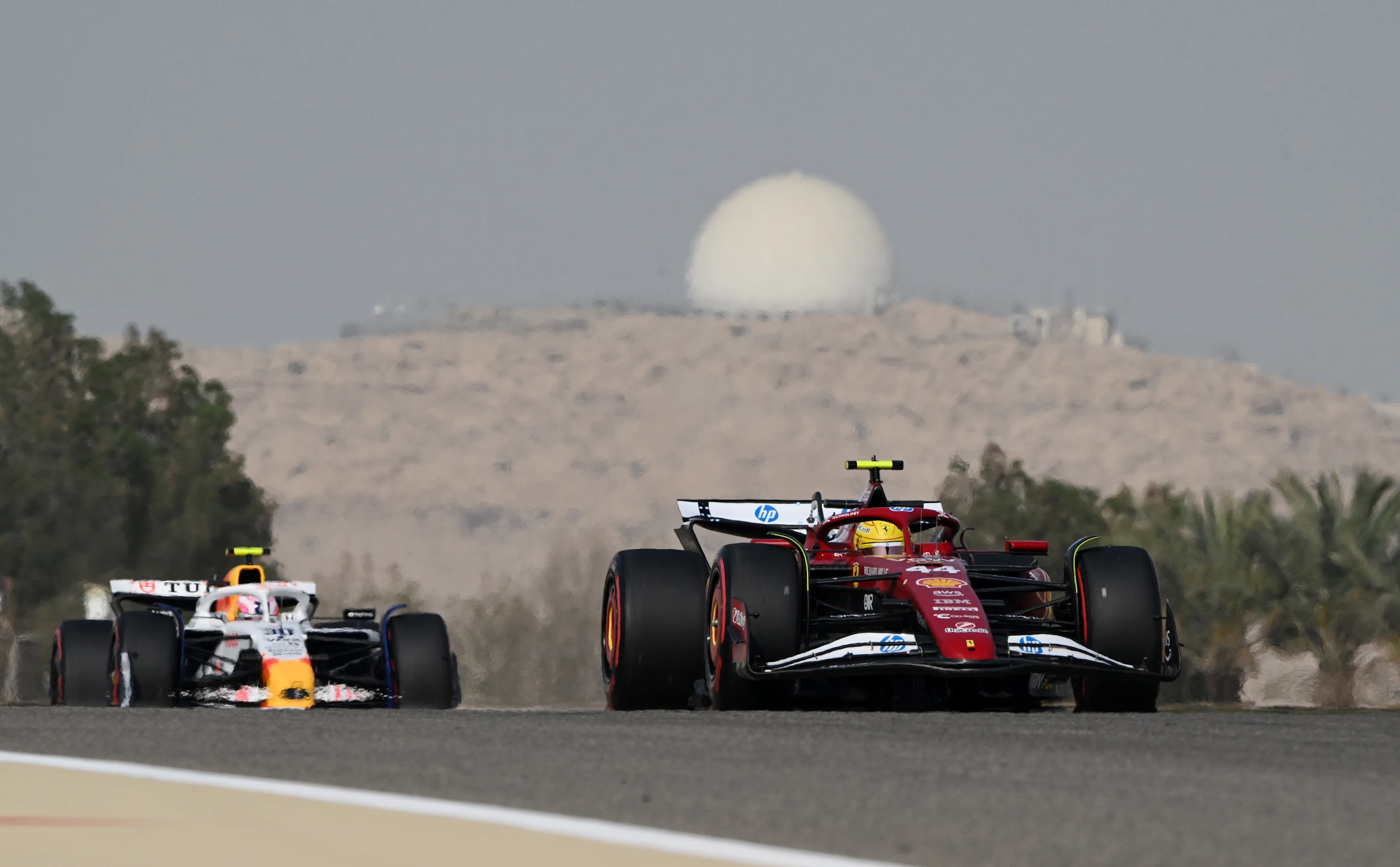 BAHRAIN, BAHRAIN - APRIL 11: Lewis Hamilton of Great Britain driving the (44) Scuderia Ferrari