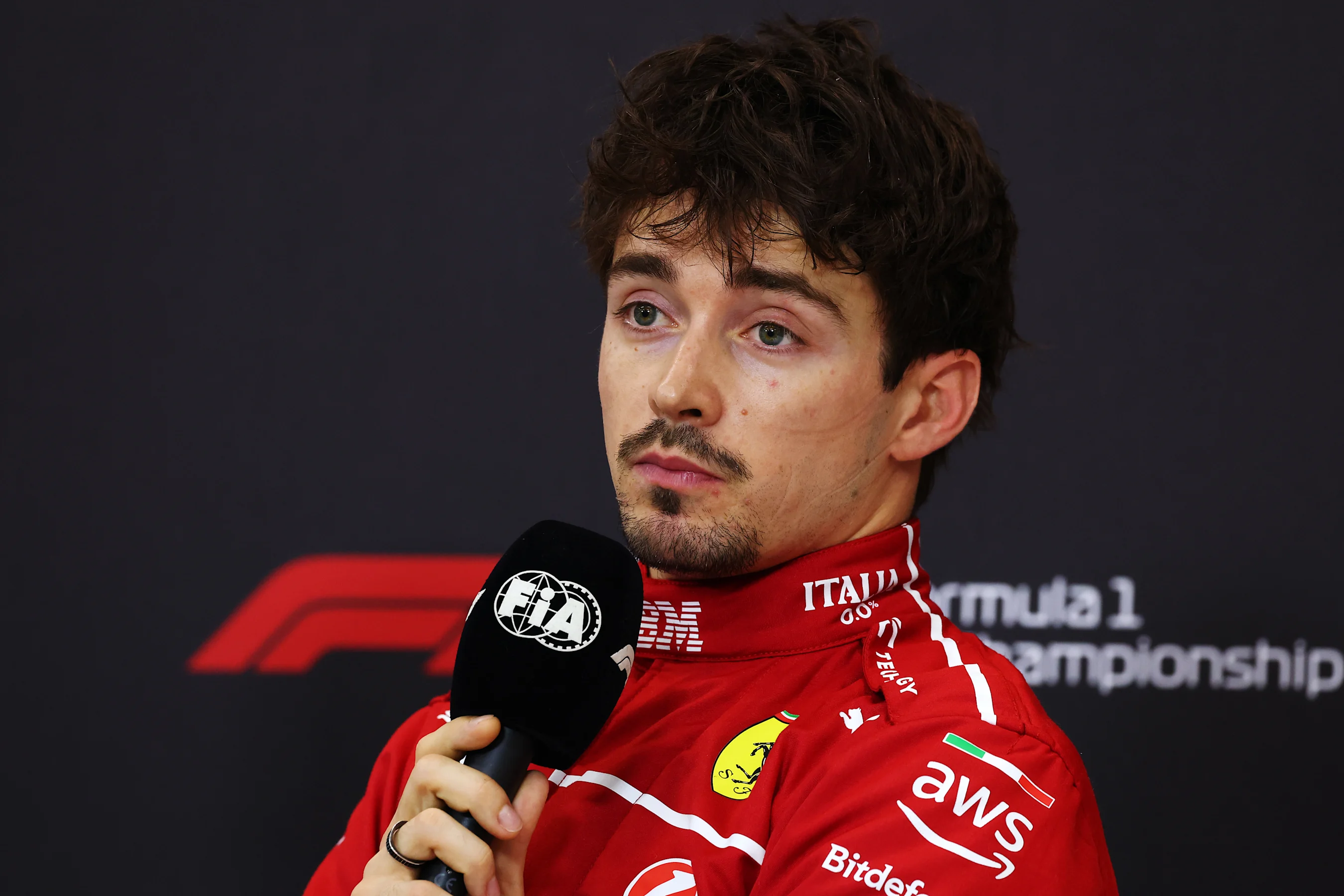 BAHRAIN, BAHRAIN - APRIL 12: Third placed qualifier Charles Leclerc of Monaco and Scuderia Ferrari