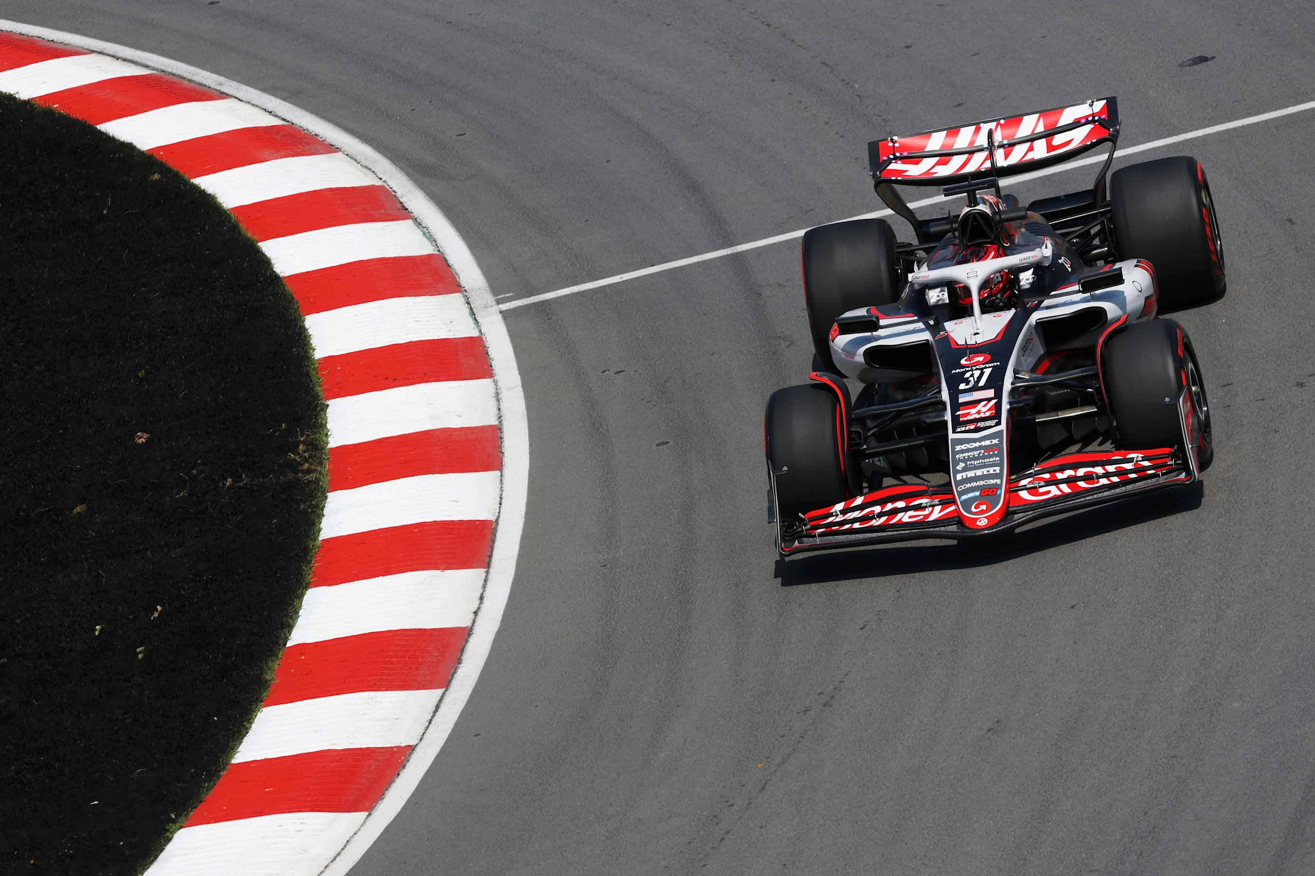 MONTREAL, QUEBEC - JUNE 13: Esteban Ocon of France driving the (31) Haas F1 VF-25 Ferrari on track