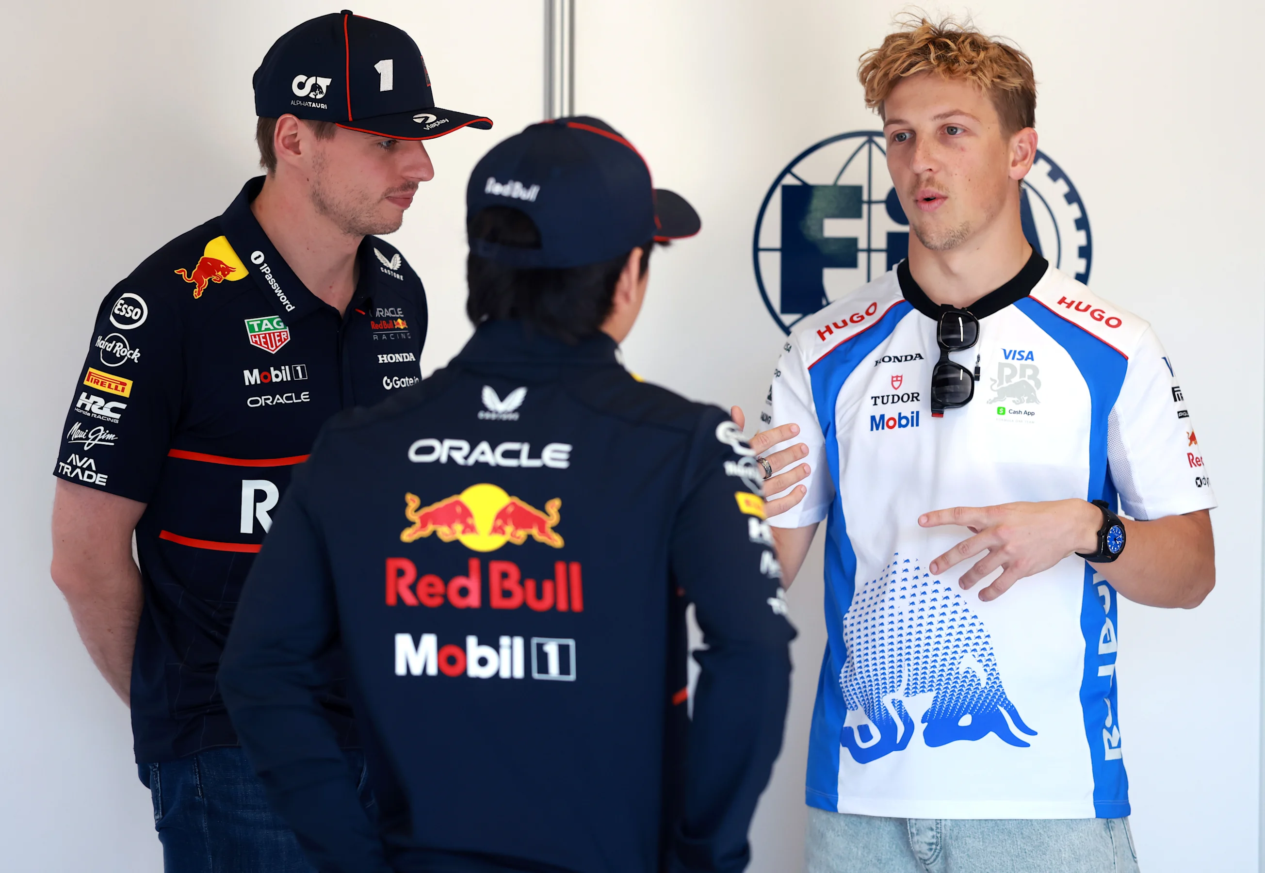 IMOLA, ITALY - MAY 18: Max Verstappen of the Netherlands and Oracle Red Bull Racing Yuki Tsunoda of