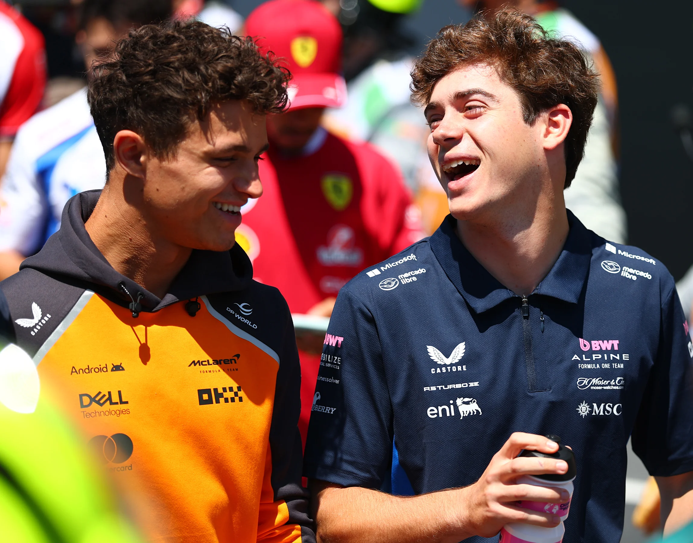 IMOLA, ITALY - MAY 18: Lando Norris of Great Britain and McLaren and Franco Colapinto of Argentina